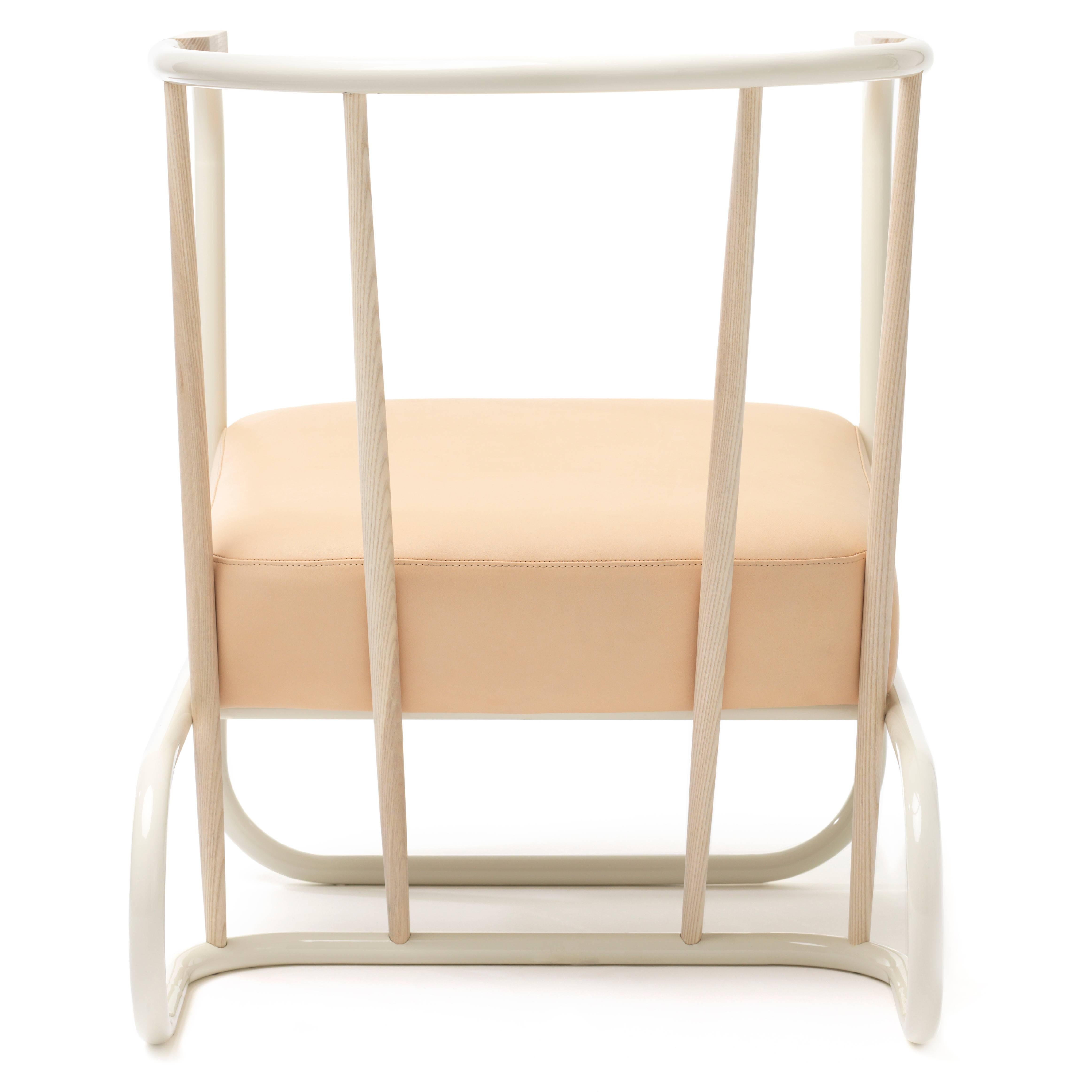 This armchair combines three traditional Swedish techniques of working with wood, metal and leather. The object is shown in a neutral pallet but a variety of leathers and colors are available.

In this chair Swedish steel has been flattened and