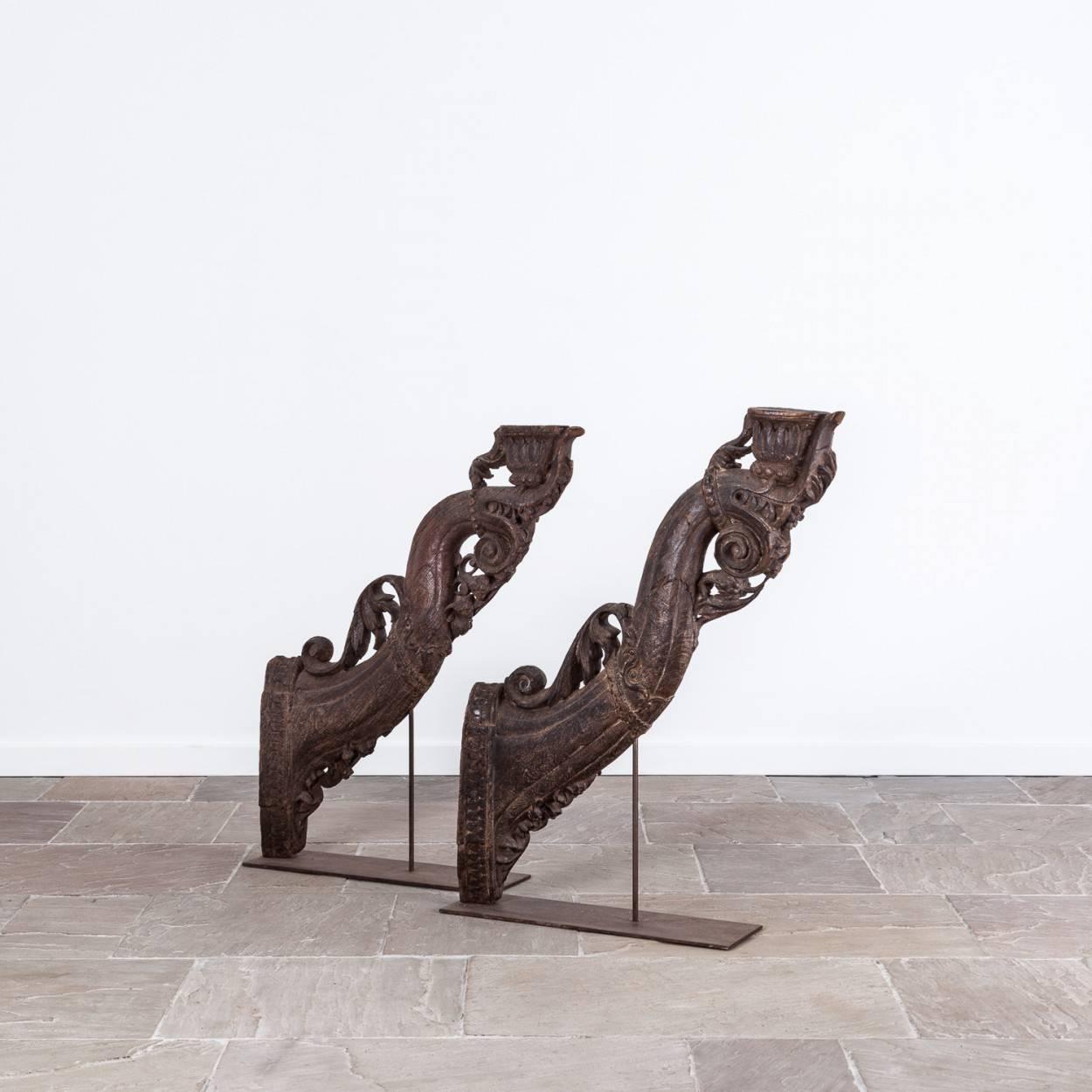 Incredible very large carved 18th century brackets which were probably once used as balcony supports.

They have now been mounted on bespoke bases so they may be displayed independently as a standalone decorative item. 

One measures