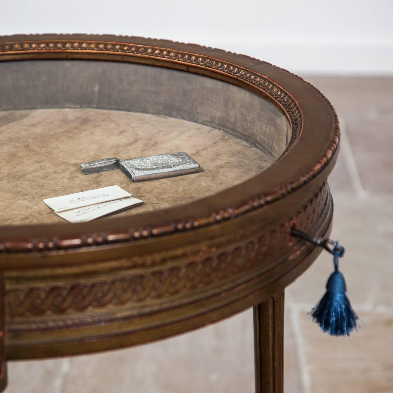 Circular giltwood bijouterie table, circa 1900

Lovely unusual piece. 

Measure: 78cm high by 58cm in diameter.
