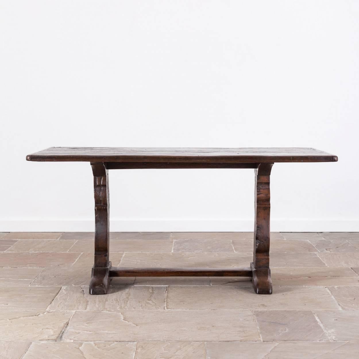 Very attractive 19th century trestle table. The top is made from older 17th century timbers.

Measure: 72cm high, 156cm long and 79cm deep.