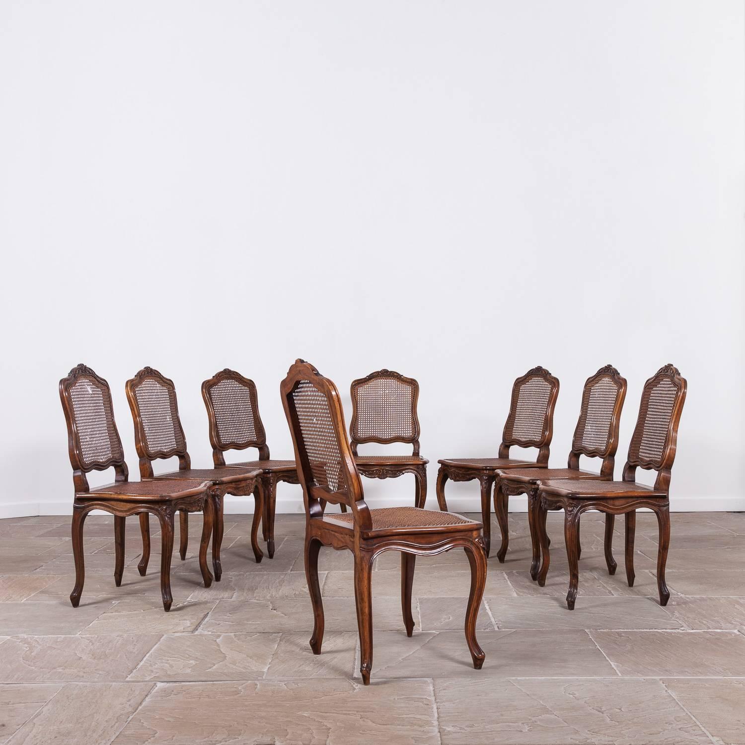 Caning Set of Eight Early 20th Century French Fruitwood Chairs