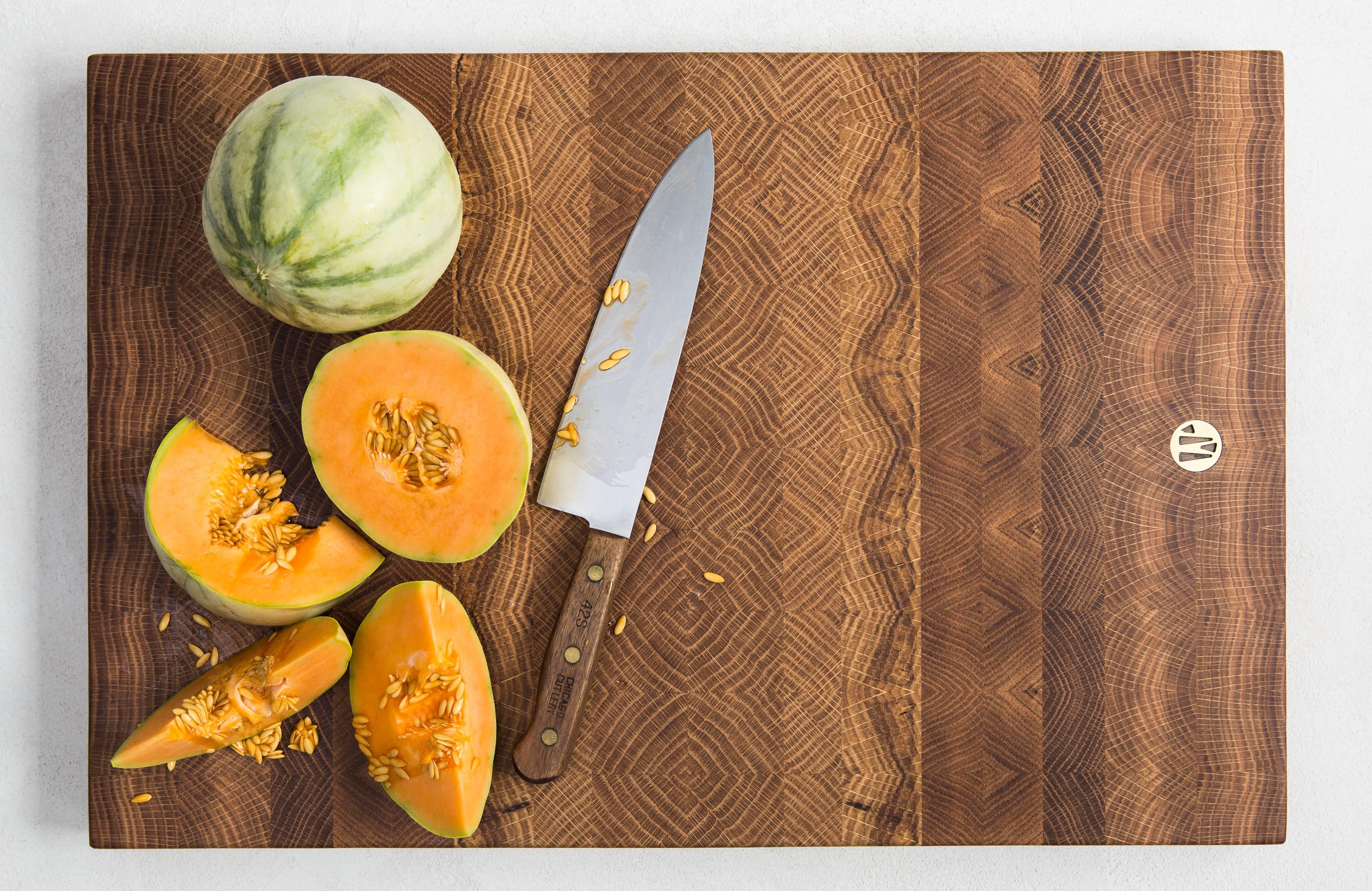 The original product that launched the Jacob may brand, these simple yet stunning cutting boards display the beauty of wood in the most dramatic way. The logo-embossed brass piece at the end of each board features a pocket in the back that allow