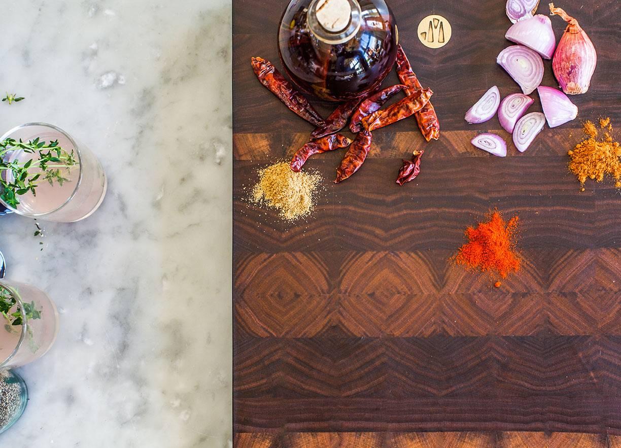 The original product that launched the Jacob May brand, these simple yet stunning cutting boards display the beauty of wood in the most dramatic way. The logo-embossed brass piece at the end of each board features a pocket in the back that allow