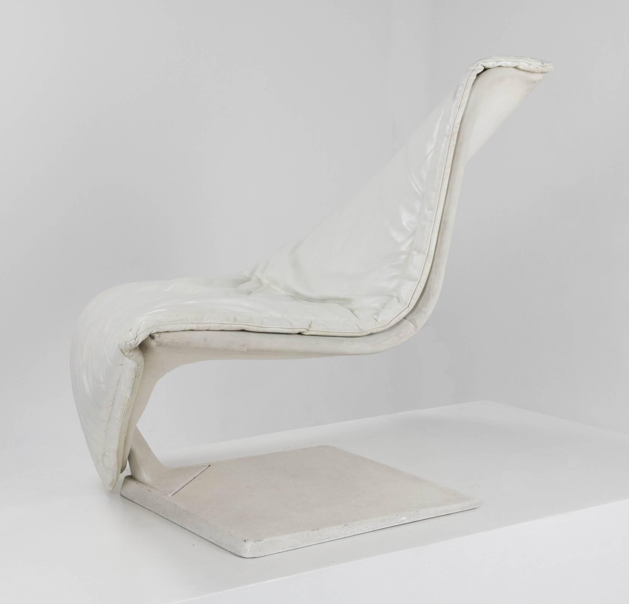 Flying carpet lounge chair by Simon Desanta for Rosenthal Einrichtung with white leather upholstery formed around matte lacquered white frame.