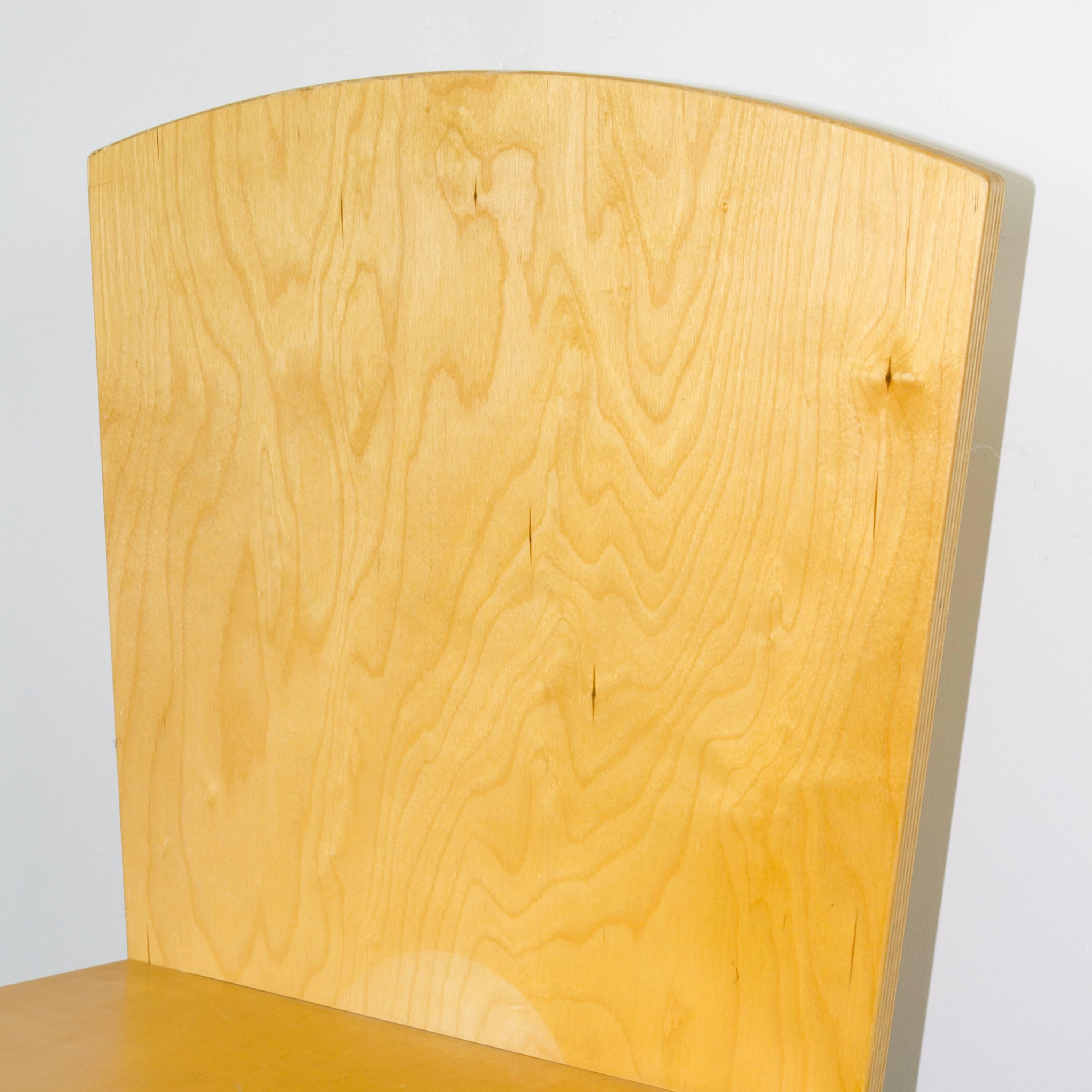 Custom side chair of interlocking plywood cutouts in the manner of Ilonka Karasz.
