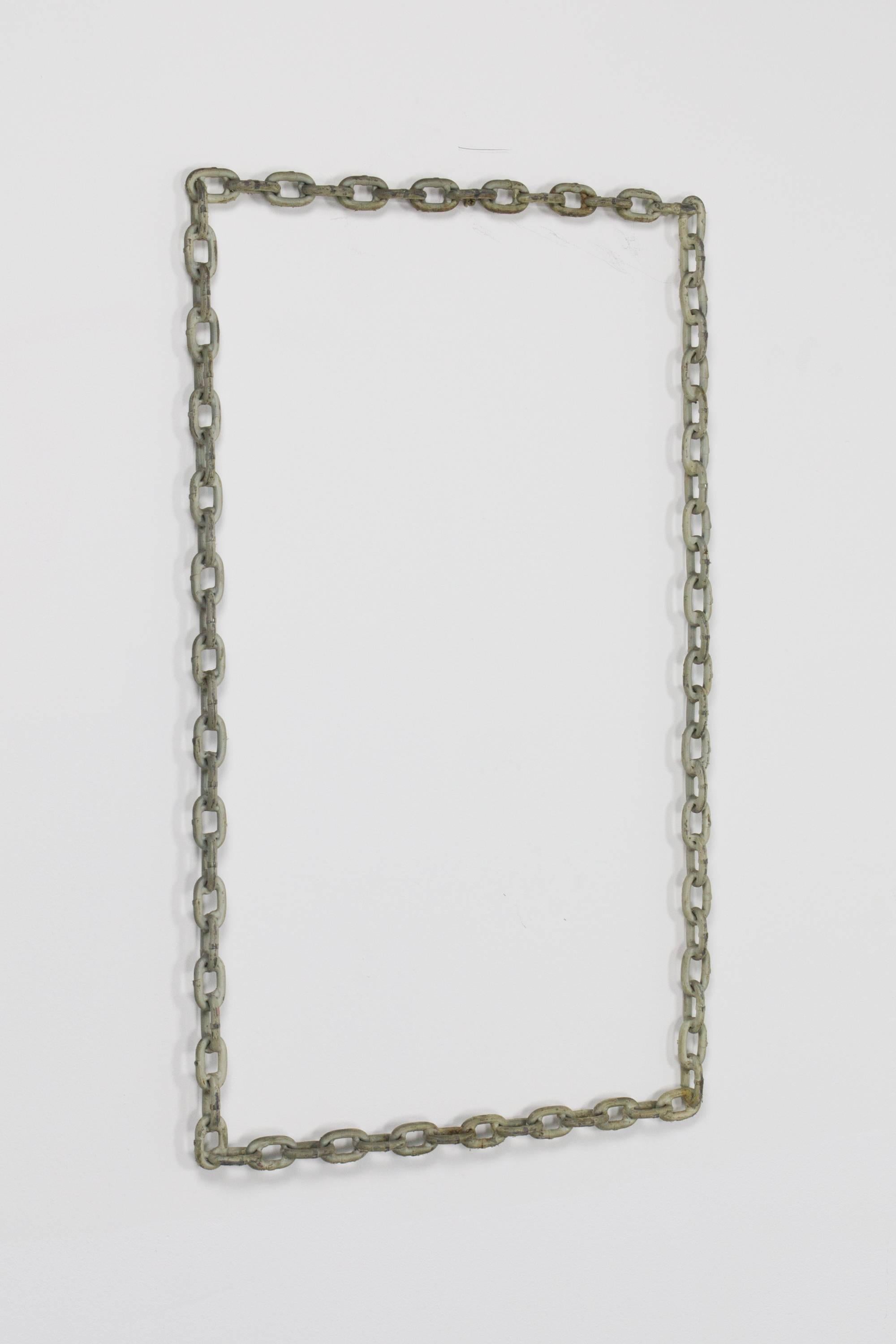 Welded handmade chain wall hanging with distressed white paint for use as decoration or as a frame.