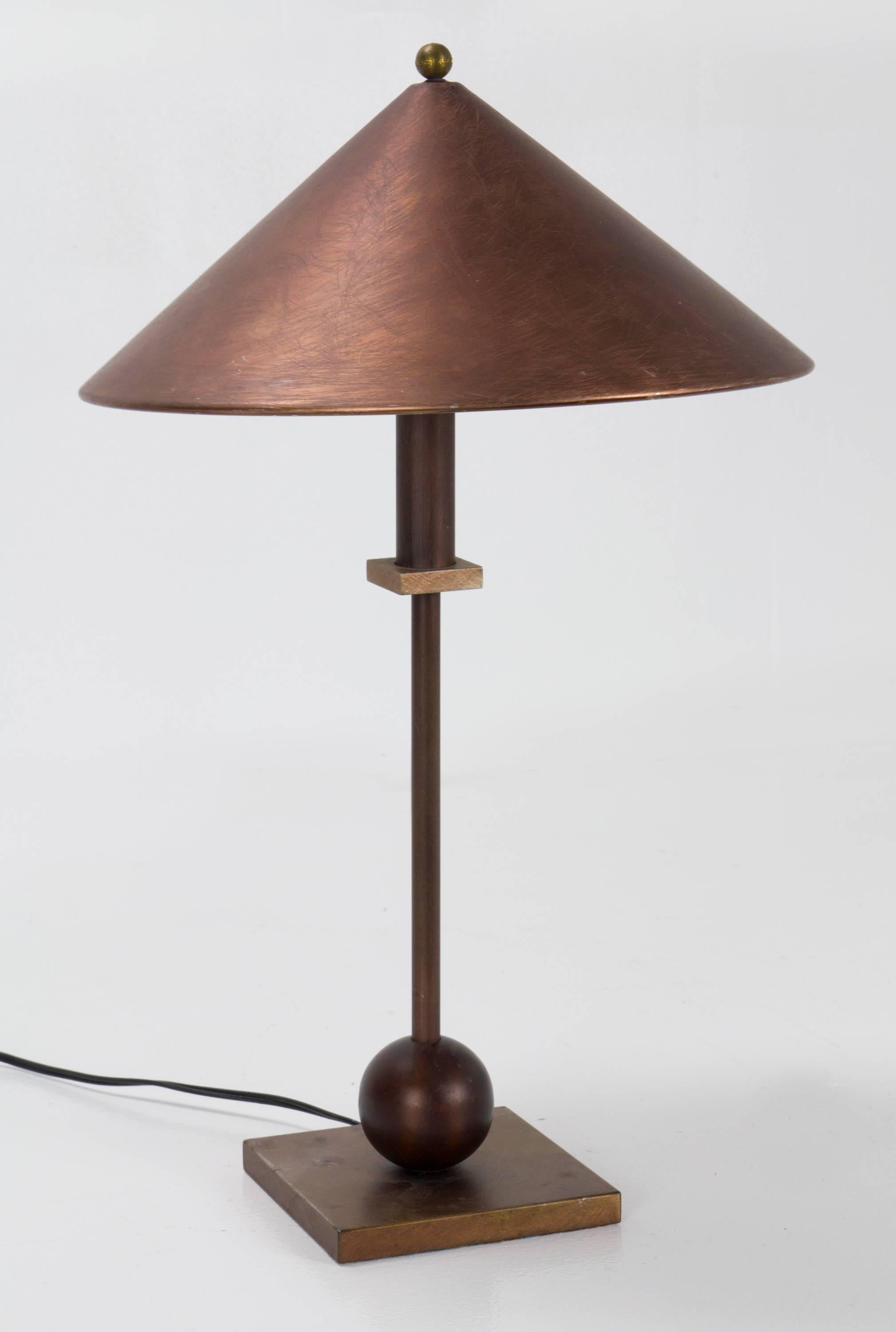 Pair of Postmodern table lamps by Robert Sonneman for Kovacs in a lesser seen brushed copper finish with heavy brass bases.