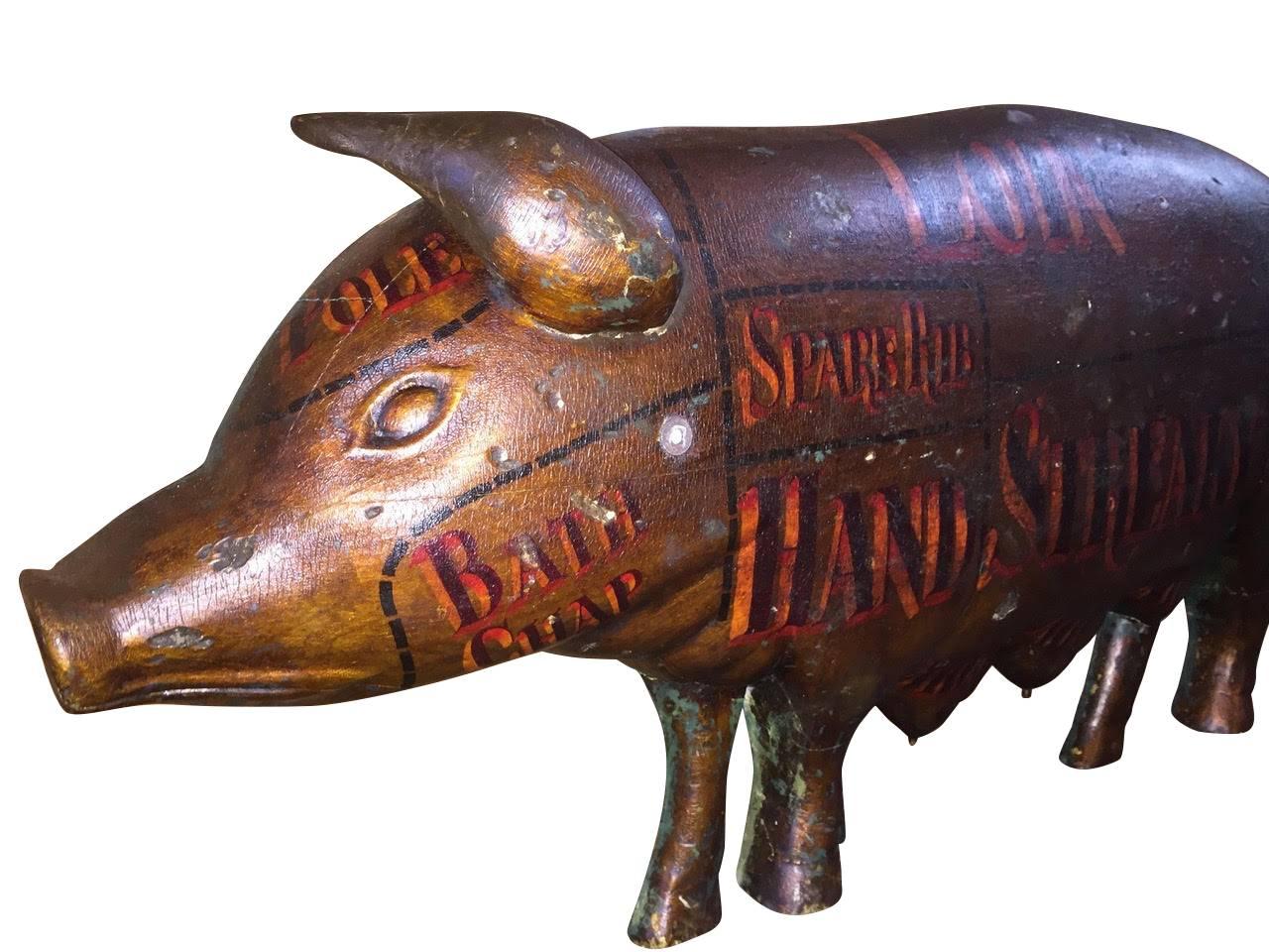 Butcher trade sign of large sow, original paint showing the different cuts of meat,
circa 1890
Measure: 48