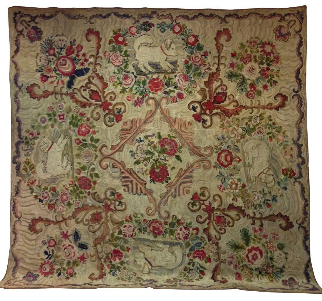 Folk Art room size hooked rug with king Charles Spaniels, 
circa 1870 found in Maine extremely rare and in excellent condition
Measures: 137