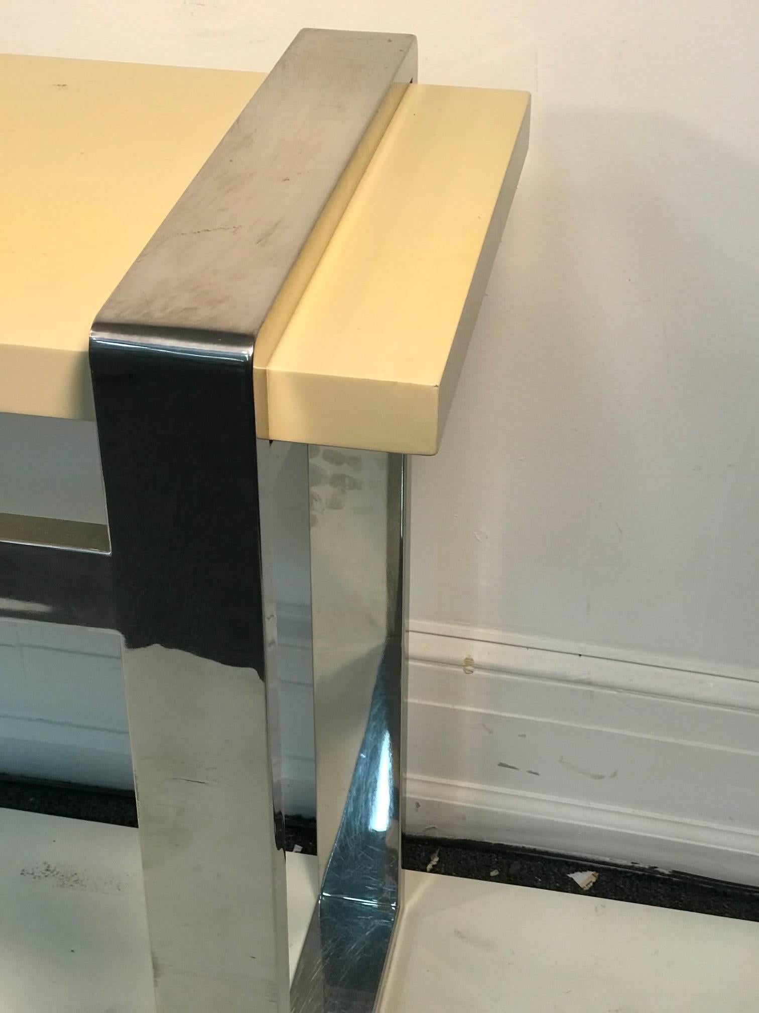 Chrome side table with faux goatskin top or console table.