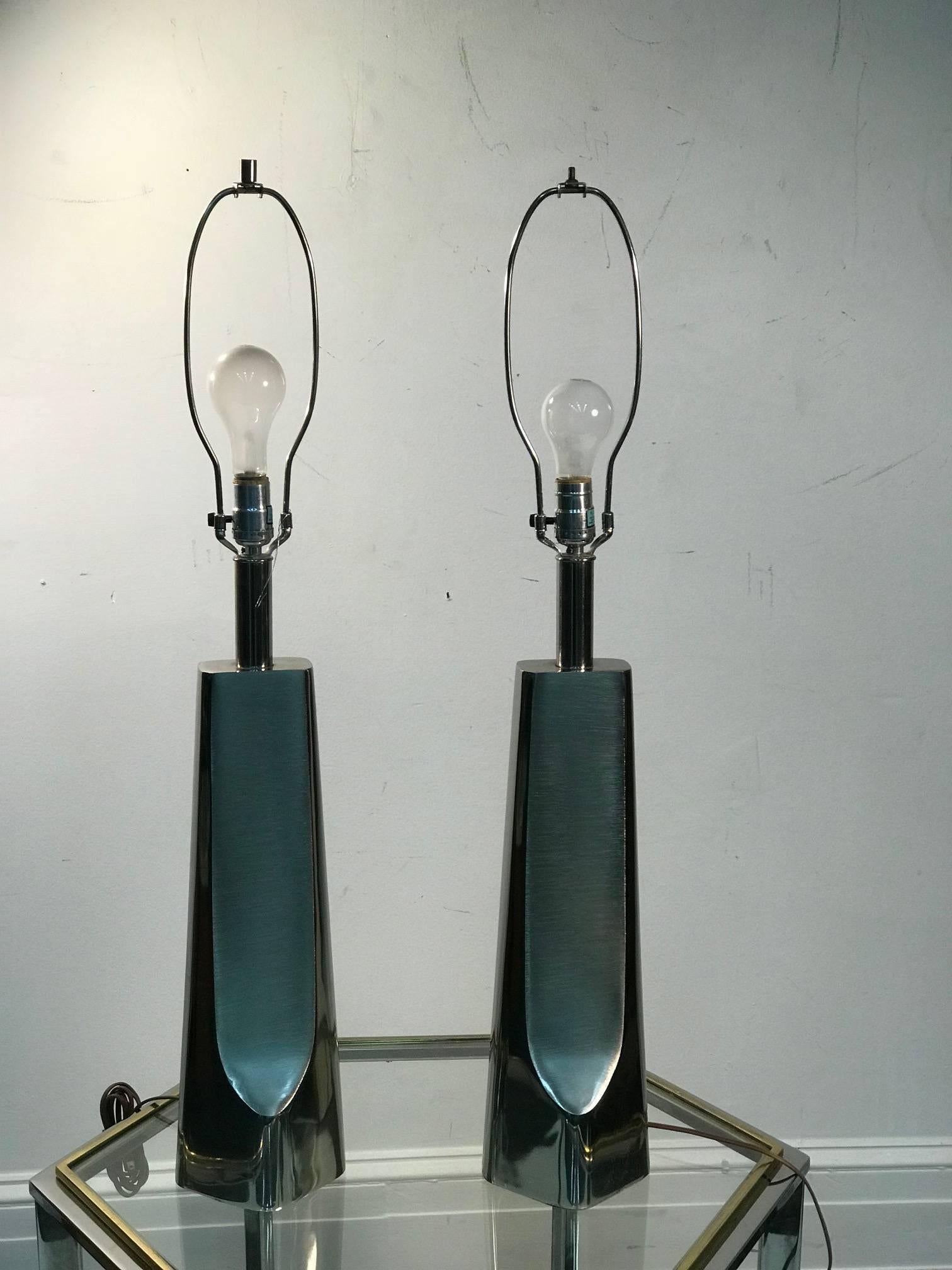 Modernist sculptural lamps by Laurel original shades.