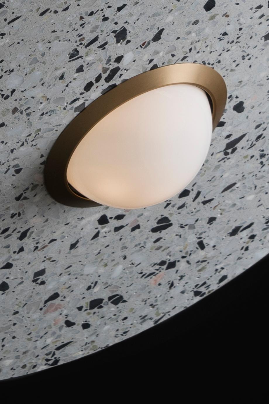 Terrazzo pendant lamps designed by Cantonese studio Bentu Design

Black wire 2m adjustable. Bulb G4 LED / 220V / 3W
Measures: Ø 45 × H 15.5 cm.

These pendant lamps are available in different colors of terrazzo: white, black, red or blue.

Bentu