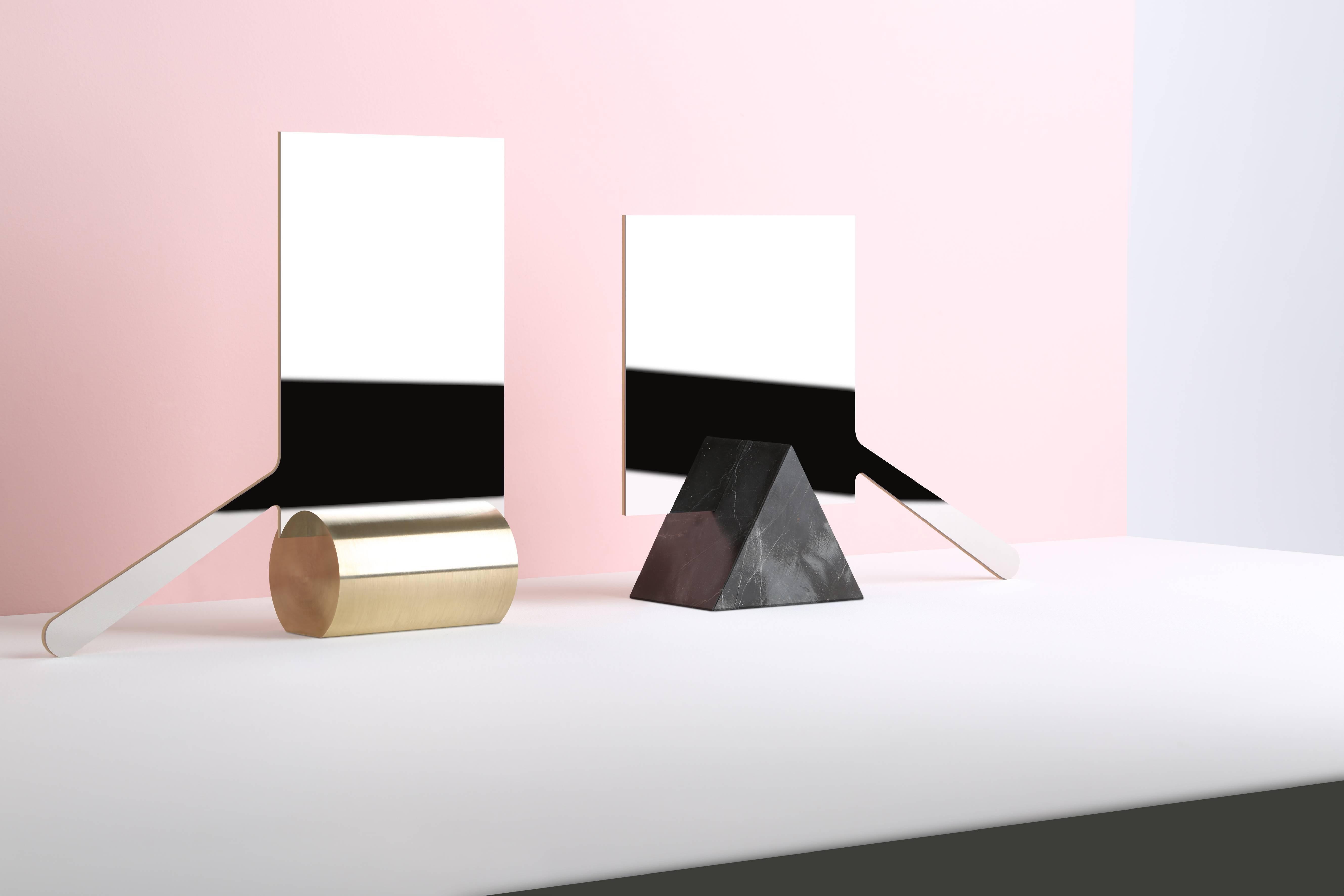 Mirrors collection by Lebanese designer Richard Yasmine
Super-mirrored polished stainless steel sheet – Marble, brass or metal pedestal
Variable dimensions depending on different models. 

Square model:
12 x 12 x 0.3 cm
(Cylindrical base: 8 x