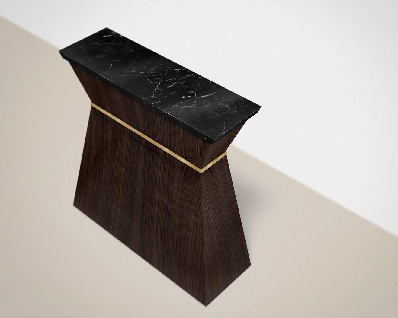 Console designed by French design studio Hormé

Piece numbered and signed

Walnut matt varnish, brass girdle and Marquina marble-top.

Measures: 100 x 77 x 24 cm (standard-size).

Inspired by Greek mythology, its richness and poetry, Hormé