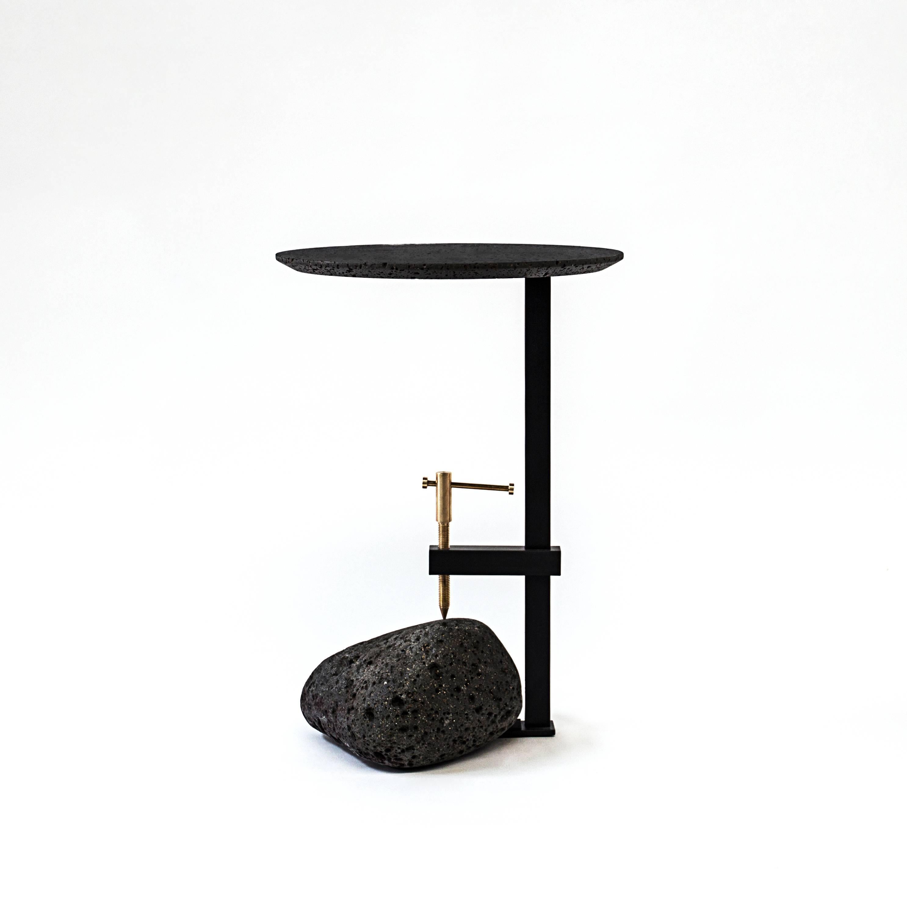 Studio Buzao
Black lava stone and concrete table designed by Cantonese studio Buzao

Black lava stone
50 x 33 x 33 cm

........
“F” side table from Buzao collection is a creation by the young designers of Studio Bentu based in Guangzhou.

Their