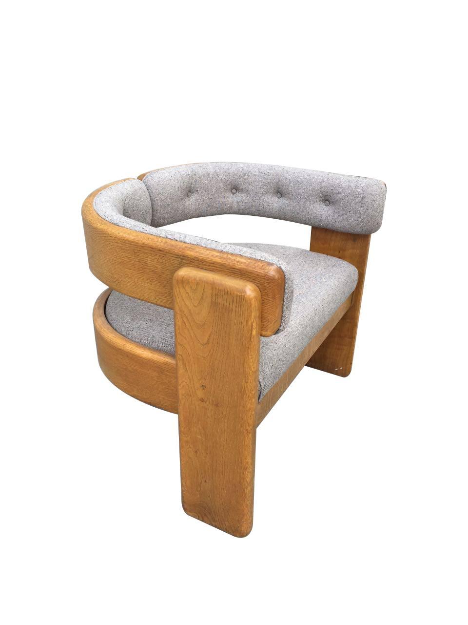 1970s. Rob wood structure. Curved design with backrest and seat in gray upholstery and smooth supports.

Tobia Scarpa was born in Venice and trained as an architect at IUAV University in the same city, where he met his wife and collaborator Afra