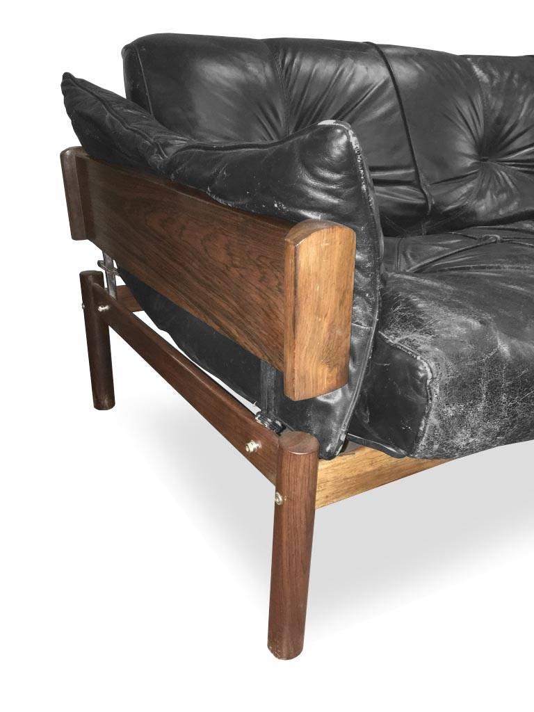 1960s, wooden structure with backrest and seat in black leather upholstery.