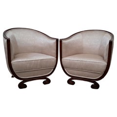 Ein Paar Clubstühle aus Mahagoni im frühen Art-Déco-Stil, Frankreich, um 1925
