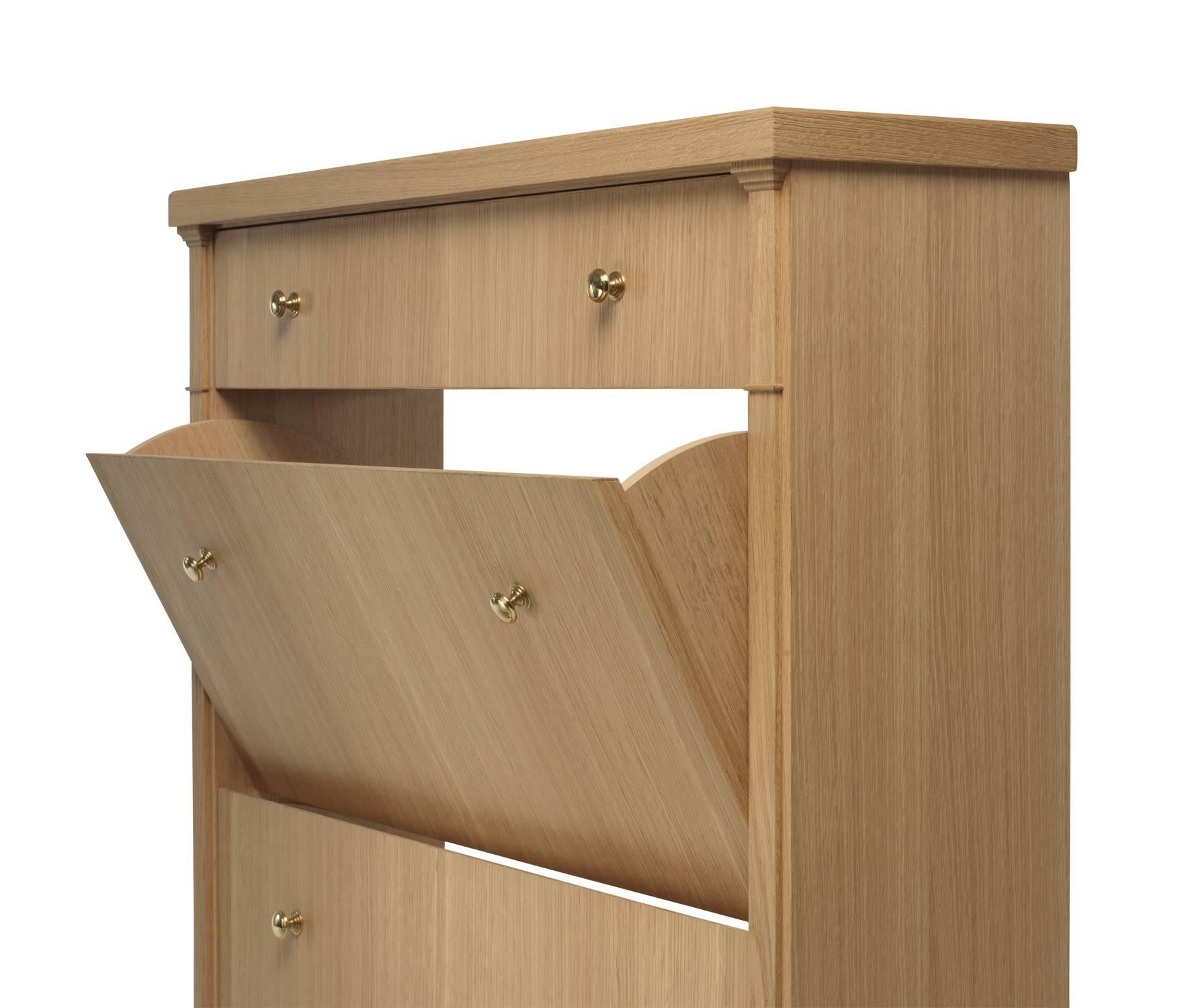 A storage cabinet for ladies shoes, featuring drawers that rotate outwards, giving easy access to shoes while providing clean lines when closed. Can be customized to any size.