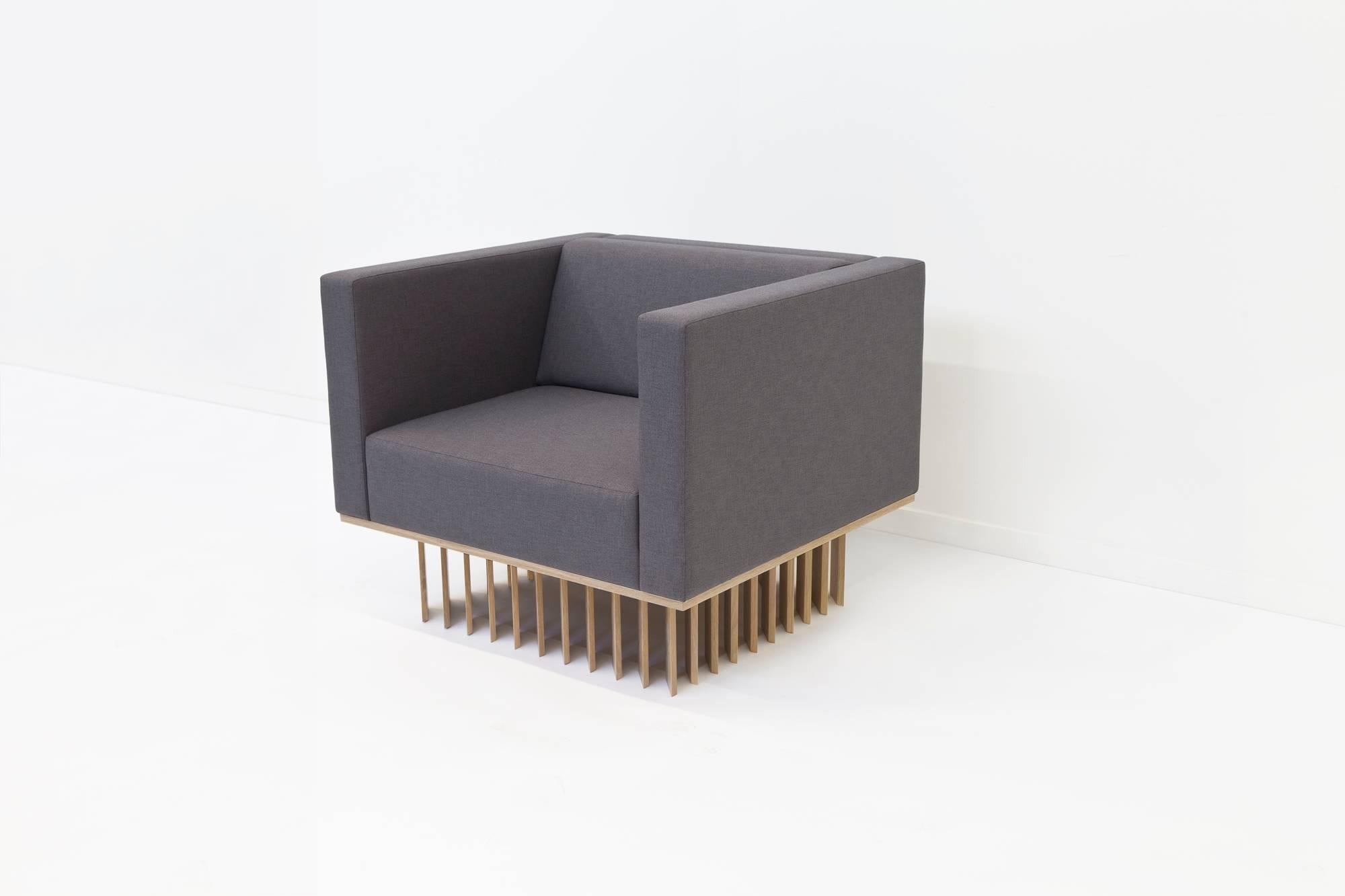 Not So General Gallery in Los Angeles is proud to present tthe Angled Wood Bar Lounger / Lounge Chair from design studio Early Work which is the perfect accompaniment to their Angled Wood Bar Sofa. 

Plushly upholstered in manner by Maharam, the