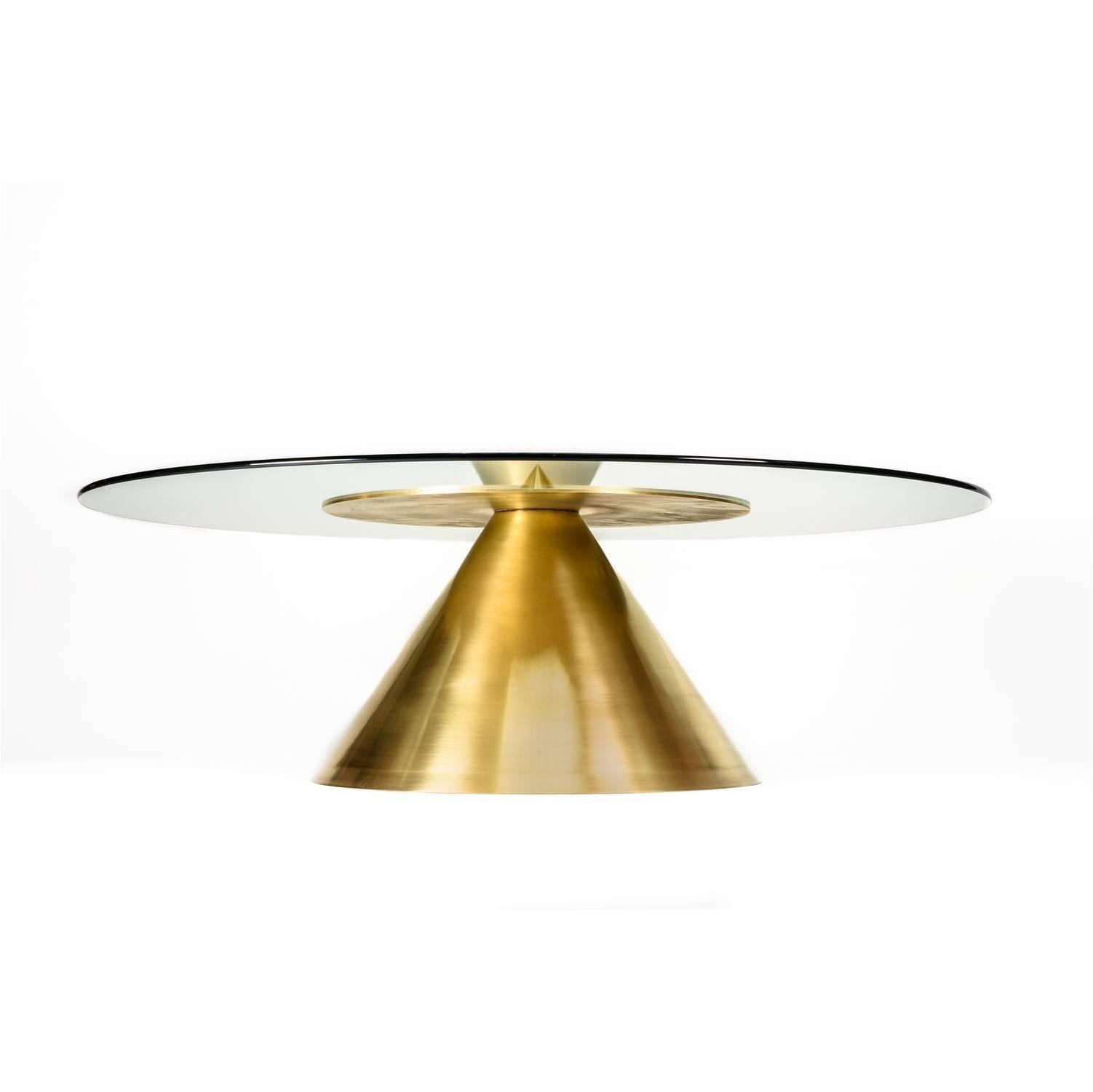 Not So General Gallery in Los Angeles is proud to present the Halo coffee table by Brooklyn-based design practice, Erickson Aesthetics which appears to be a feat of product design and engineering.

The pinnacle of the cone-shaped brass-plated Steel