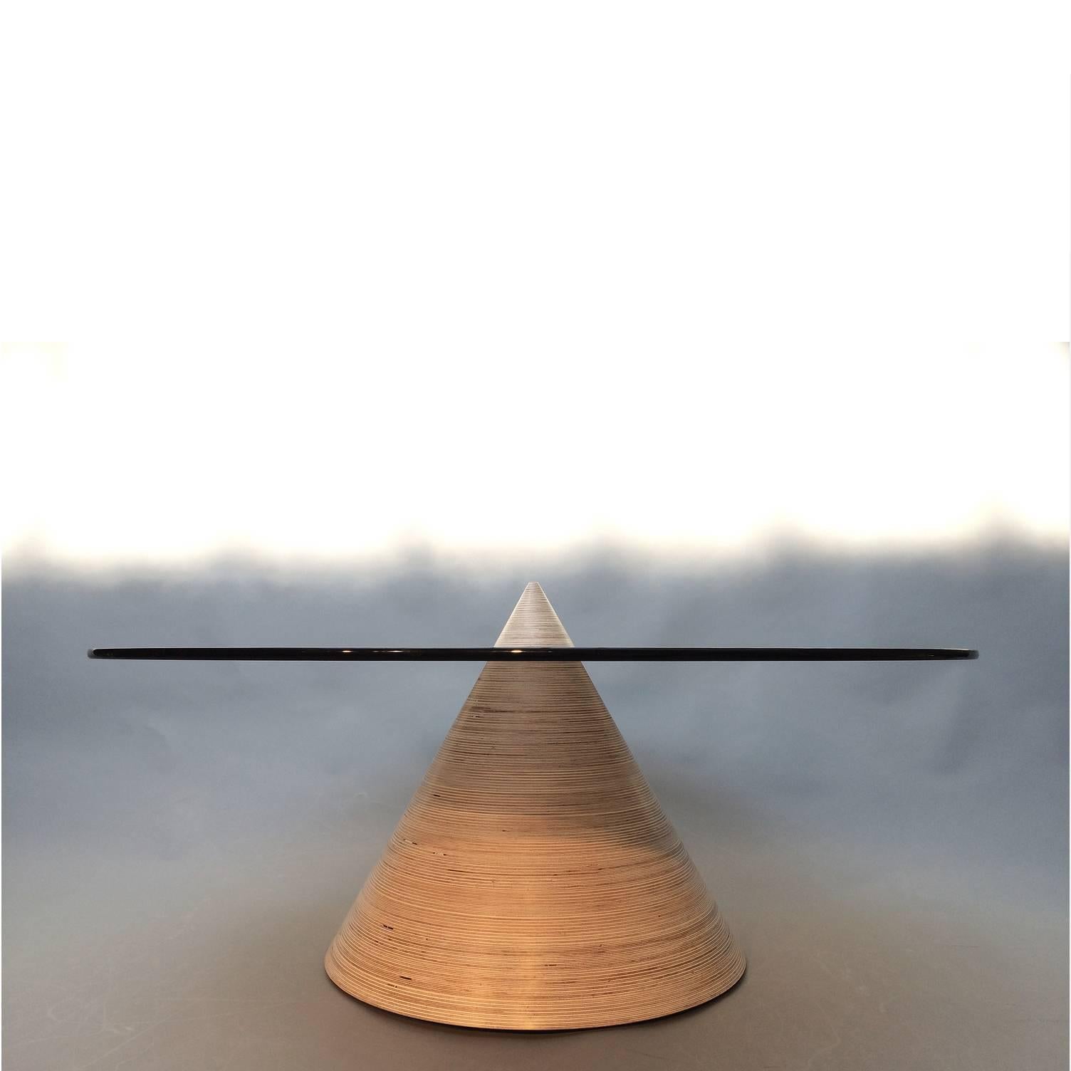 Not So General Gallery in Los Angeles is proud to present the Halo coffee table by Brooklyn-based design practice, Erickson Aesthetics which appears to be a feat of product design and engineering.

The pinnacle of the cone-shaped Laminated Birch