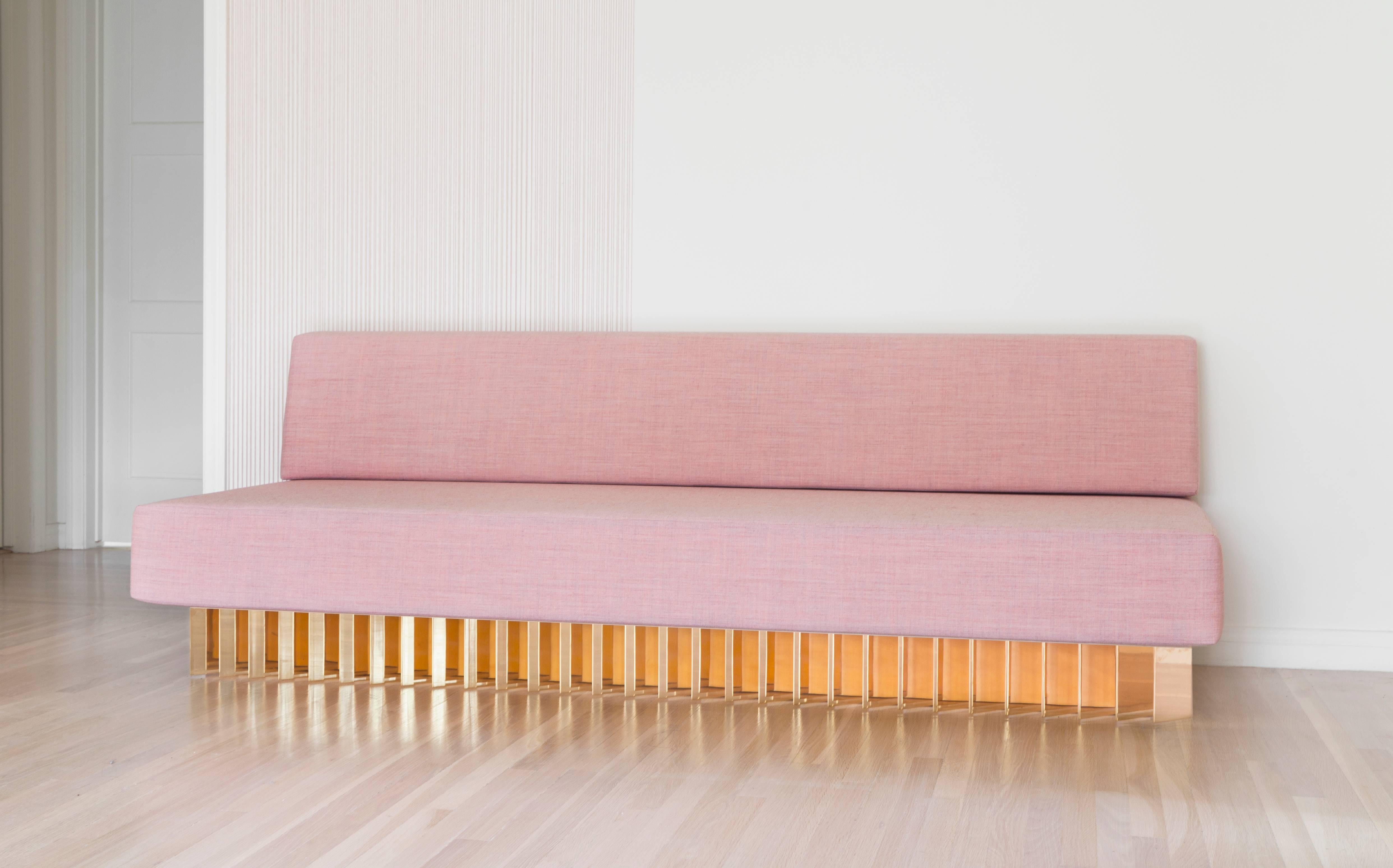 Not So General Gallery in Los Angeles is proud to present the angled brass bar sofa from design studio Early Work. A modern masterpiece this sofa is plushly upholstered in pink canvas by Kvadrat, the seat cushion of the sofa sits atop a brass