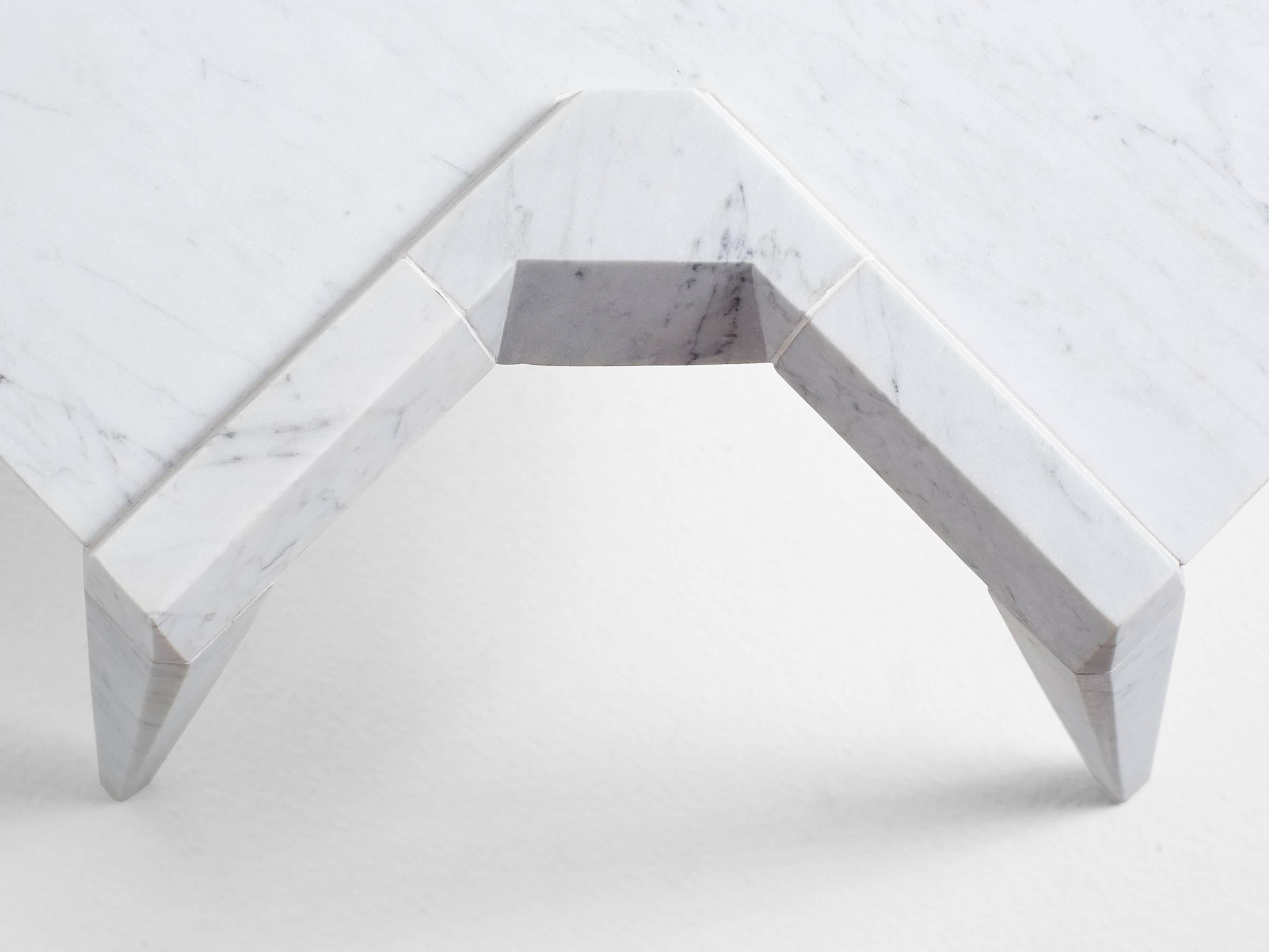 Hand-sculpted by Los-Angeles based master stone carver, Nathan Hunt, the Ragno coffee table is made entirely from Carrara marble.

Perfect as a coffee table the Ragno table can also be used as a side table or end table. As it is hand-carved by the