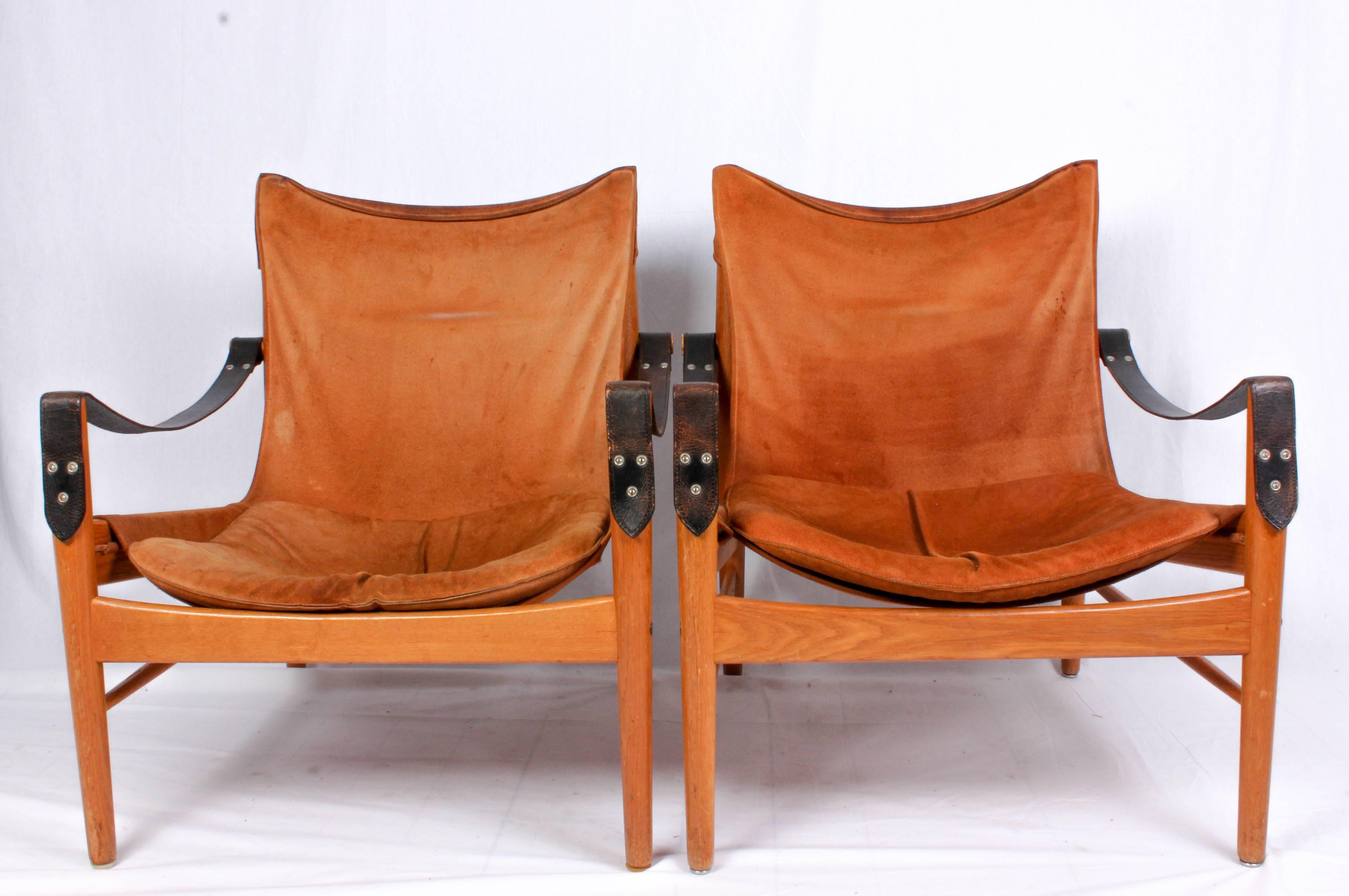 A pair of the very rare suede version of Hans Olsens chair 