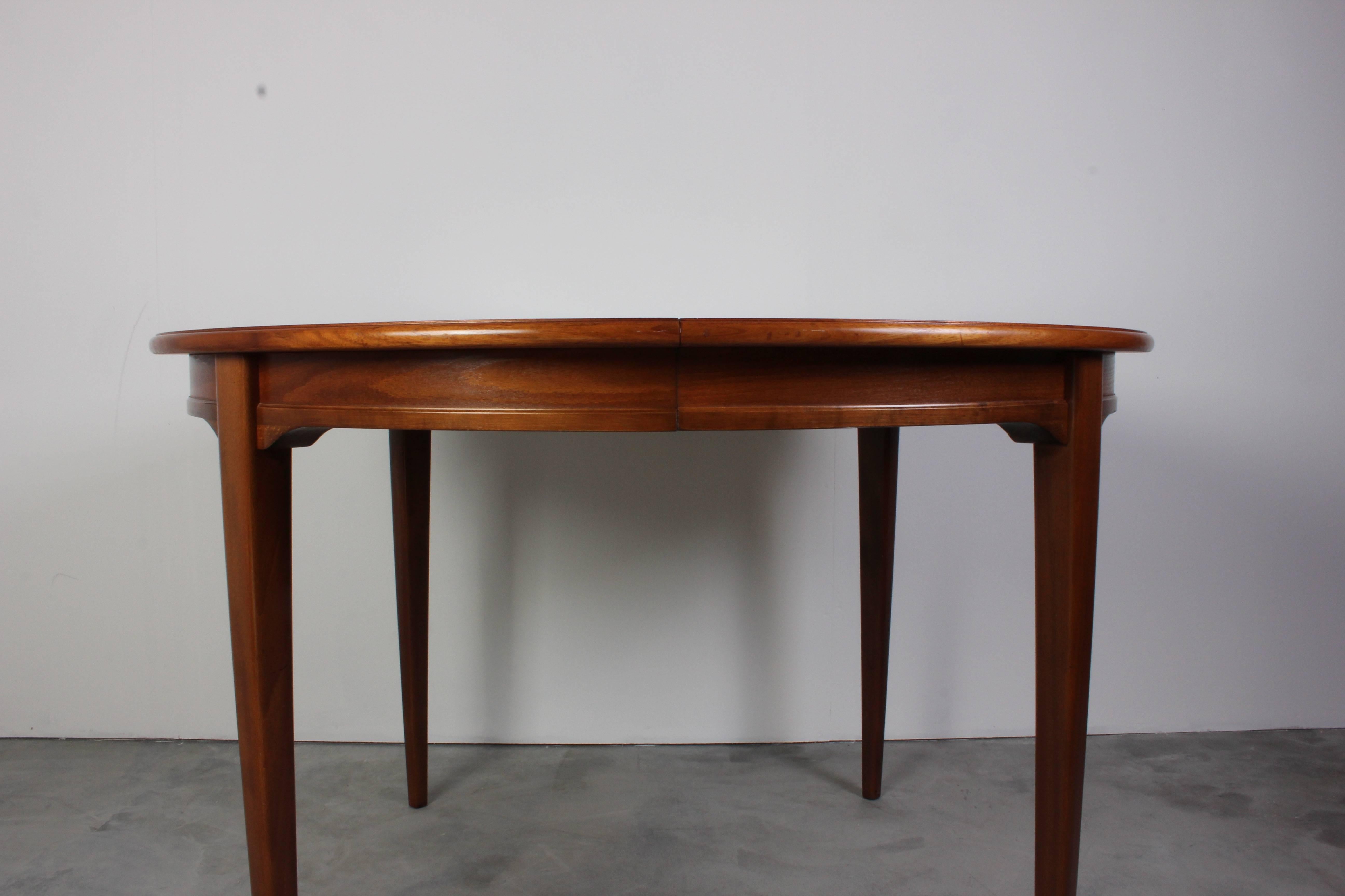 Midcentury Swedish teak dining table in very good vintage condition. This table have very nice details such as sculptured legs. There is two extra leafs that provides the possibility to make the table as long as 200cm.

This item will be available