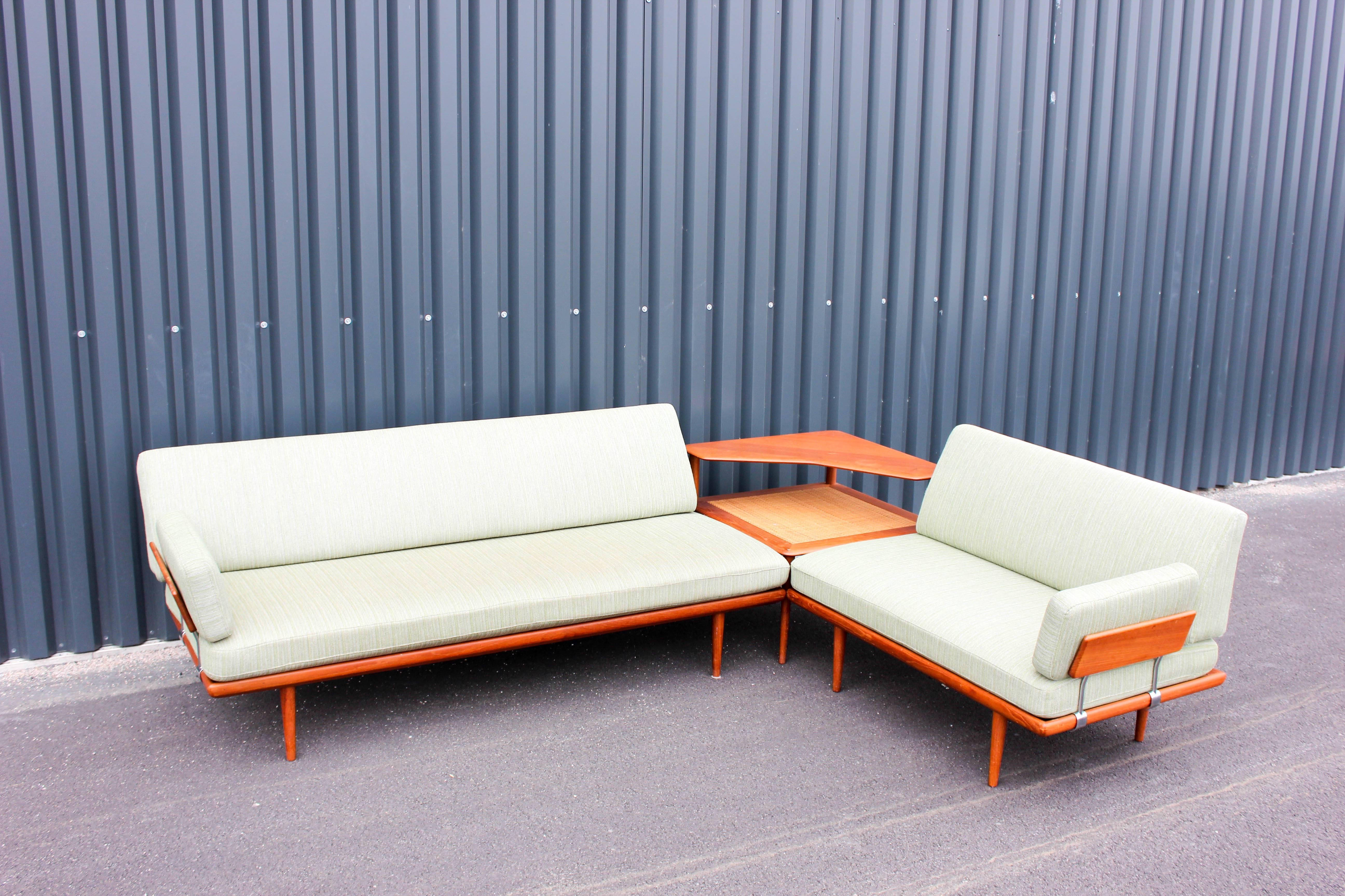 Midcentury vintage sofa set by Danish designers Peter Hvidt and Orla Mølgaard-Nielsen produced by manufacturers France & Daverkosen in the 1950s. This sofa set is famous for its design and high quality. The set contains of two sofas (daybeds) and a