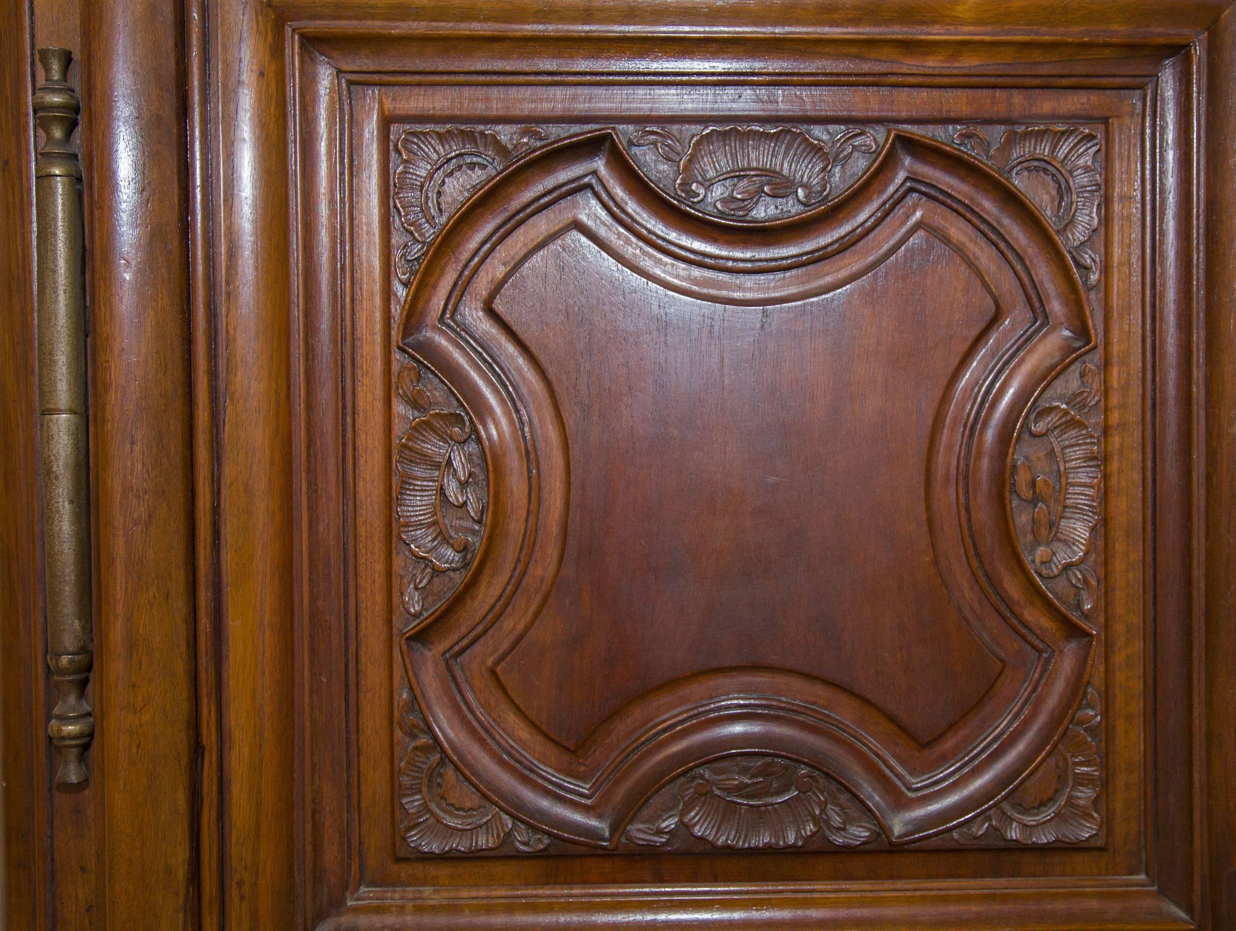 Carved 19th Century Louis XIV Style Walnut French Armoire, circa 1820 For Sale
