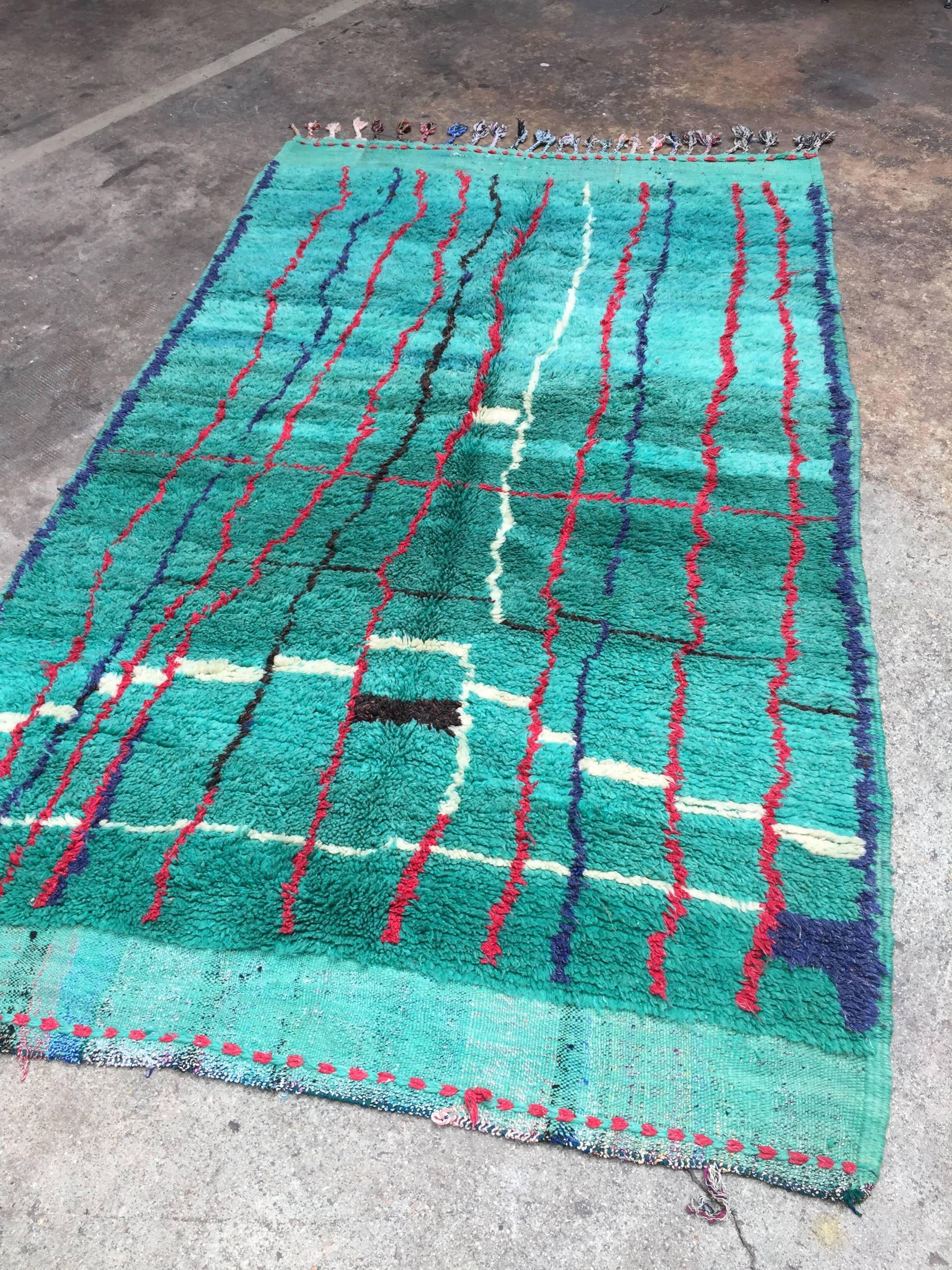 Vintage tribal Moroccan rug, probably from High-Atlas
Unusual light green wool
Materials: wool and cotton
One of a kind hand-knotted piece
circa 1980-1990.
 
