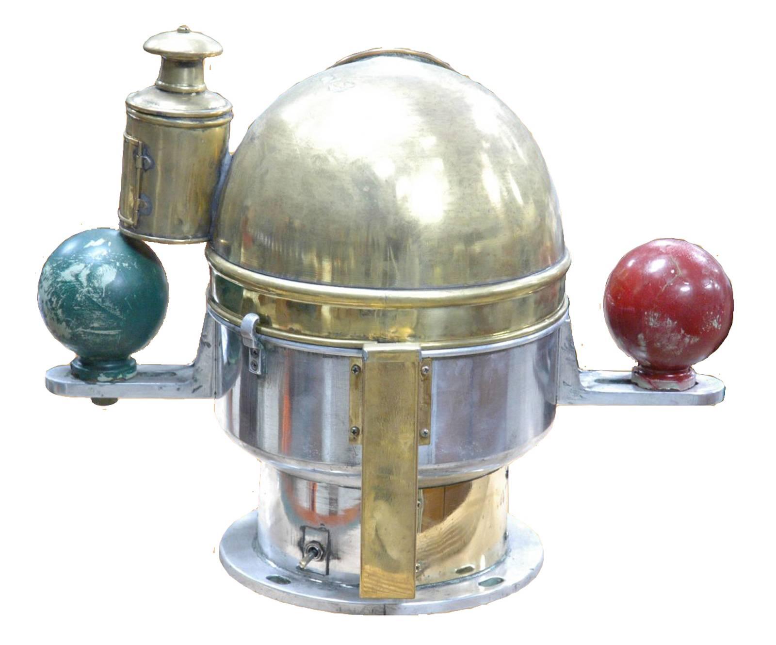 Japanese Compact Binnacle Compass made by Nunotani Seiki Seisakusho Co. Ltd. Complete with its compensating balls, oil lamp. Aluminum and brass H 40 cm / D 28 cm 18 kg.
 