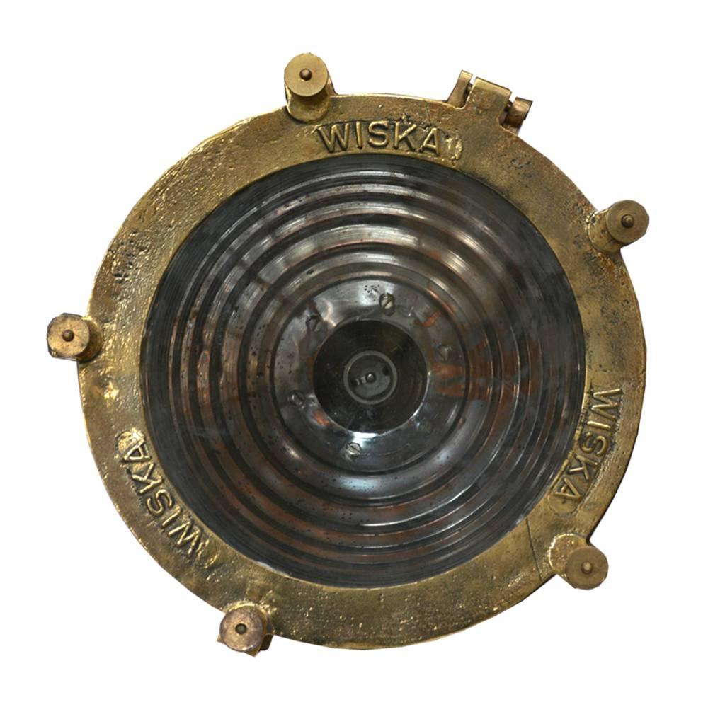 Brass and cooper fluted Cargo lights with sturdy cast brackets. Signed maker, Wiska. 
See photo before polishing.
Measrues: H 32 + handle 43 cm, D 31 cm, 6.6 kg.
 