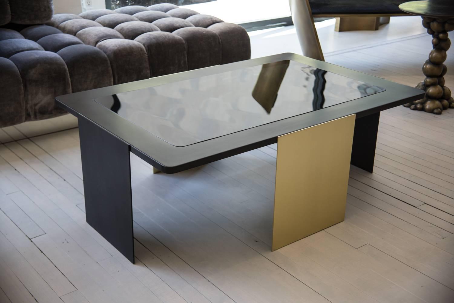 ULTIMO blackened metal coffee table, is composed of two 3/8