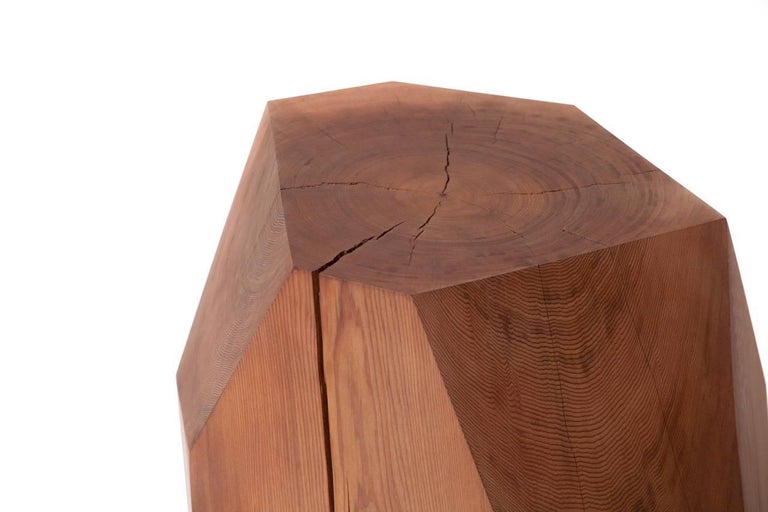 Cast-off cedar logs are given second life as a crystalline form. The natural beauty of reclaimed wood is harnessed in this side table and sculpture piece where nature informs design. Each Little Gem is hand-shaped and faceted based on the different