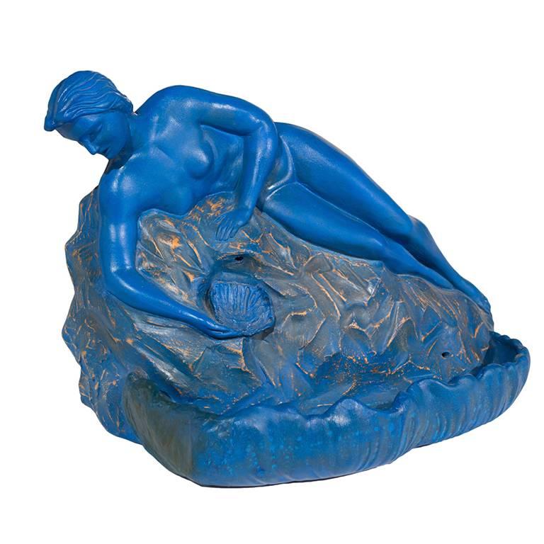 Designed by Italian artist ,architect, design, sculptor, painter and inventor Beppe Domenici in 1960s, this sketch for a Venus fountain is made in blue glazed pottery and represents a nymph with a shell.