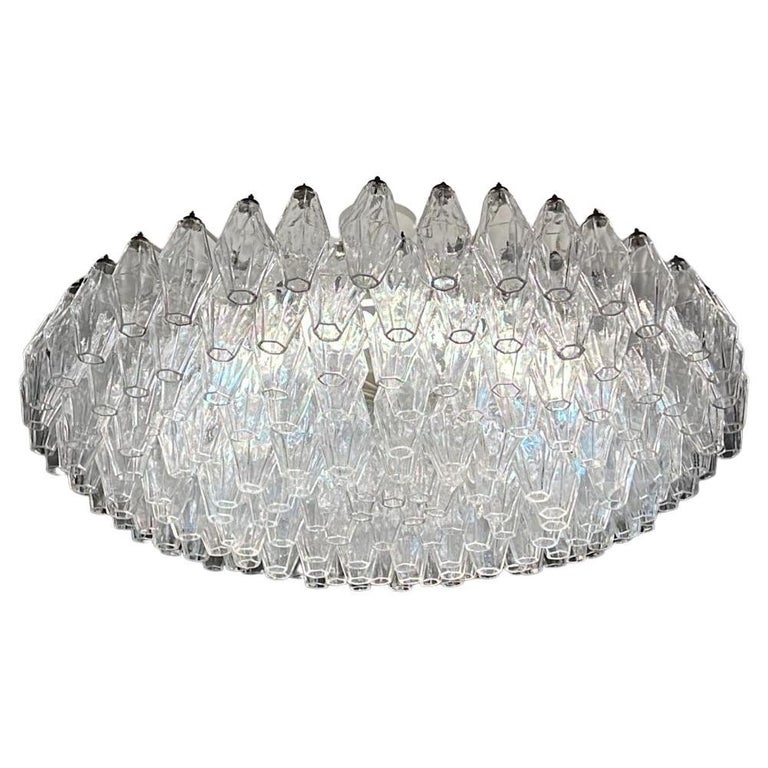 Carlo Scarpa Poliedri Chandelier from Venini, Venice, Italy 50s This fantastic Chandelier is made up of more than 200 transparent blown glass polyhdra. Mounted on their original white lacquered metal structure, this Chandelier is the first and