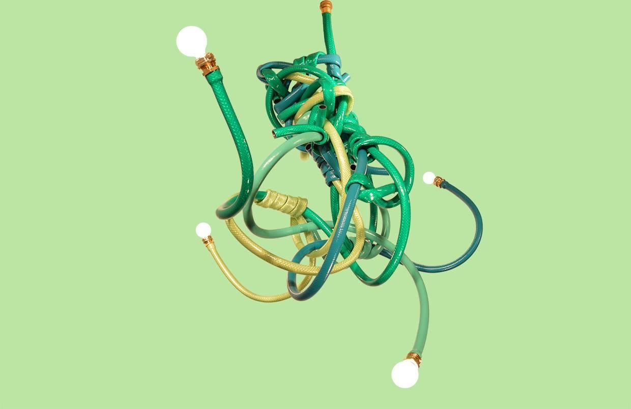 Contemporary and playful chandelier style lighting design created from actual garden hoses to add subtle wit and a sculptural ambiance to your interiors. Easily installs directly into standard ceiling fixtures and uses 40w incandescent or 60w LED