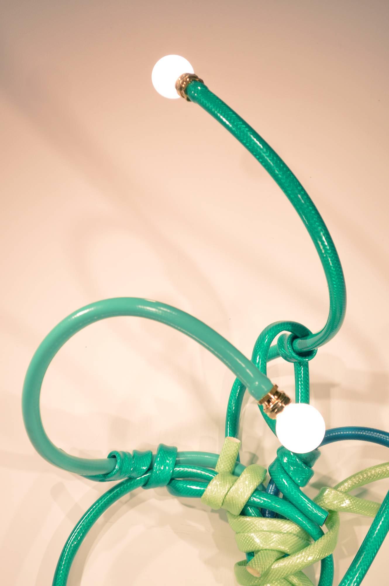 Contemporary Sconce Style Lighting Fixture Made from Garden Hoses of Varying Shades of Green For Sale