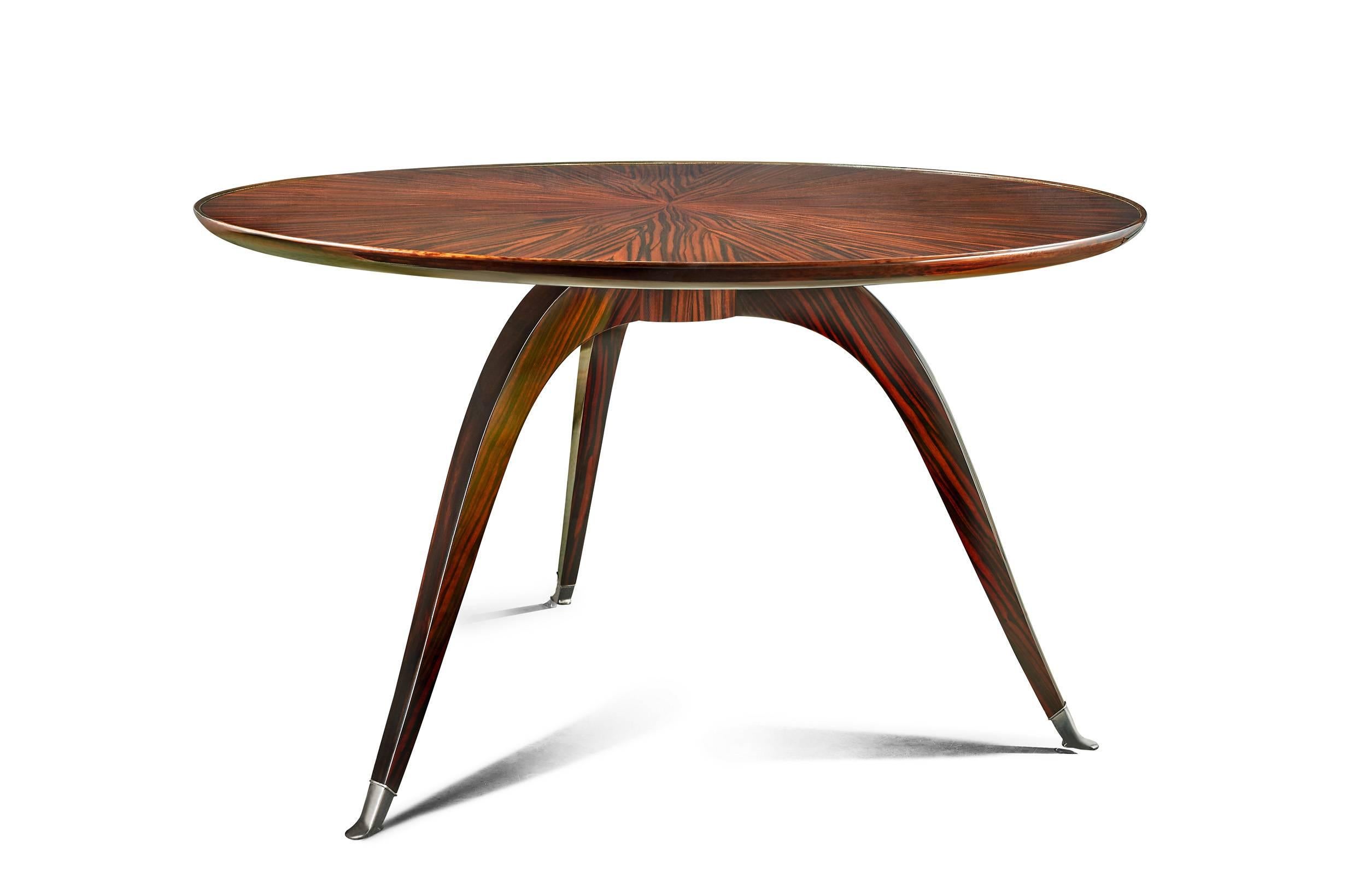Inspired by Ruhlmann creations, this table was by created by Rinck in 2006.

Details : 

Macassar ebony sunburn top,
silvered bronze sabots,
varnish finishing.