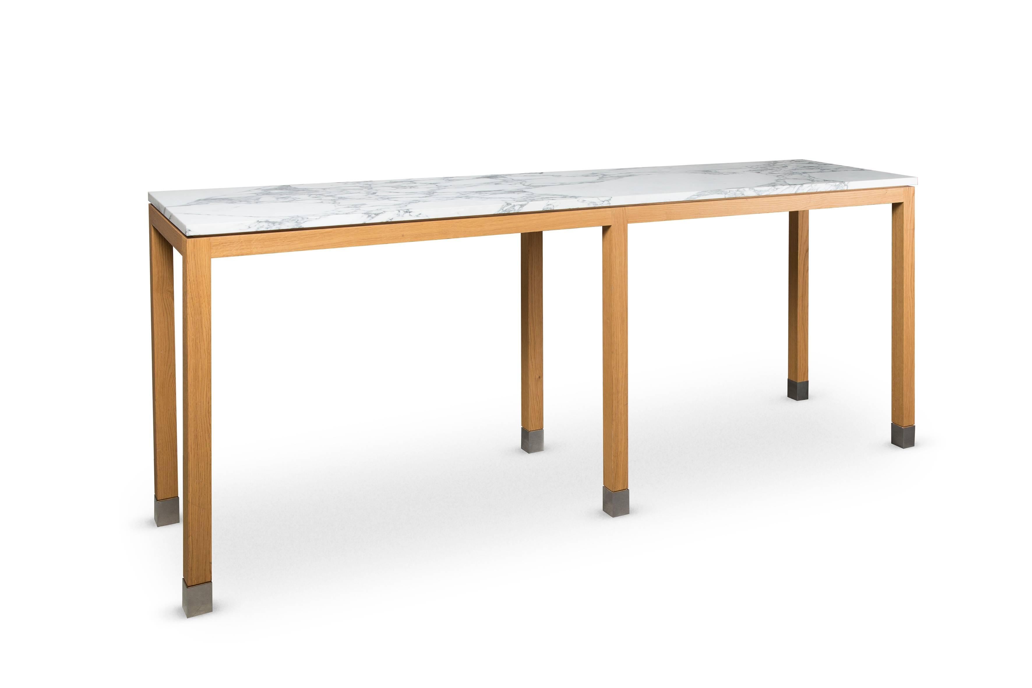 A wood and backlit marble high table, created by Rinck in 2010

Details:

Arabescato marble top, polished and backlit.
Solid oakwood base
Stainless steel sabots.

 