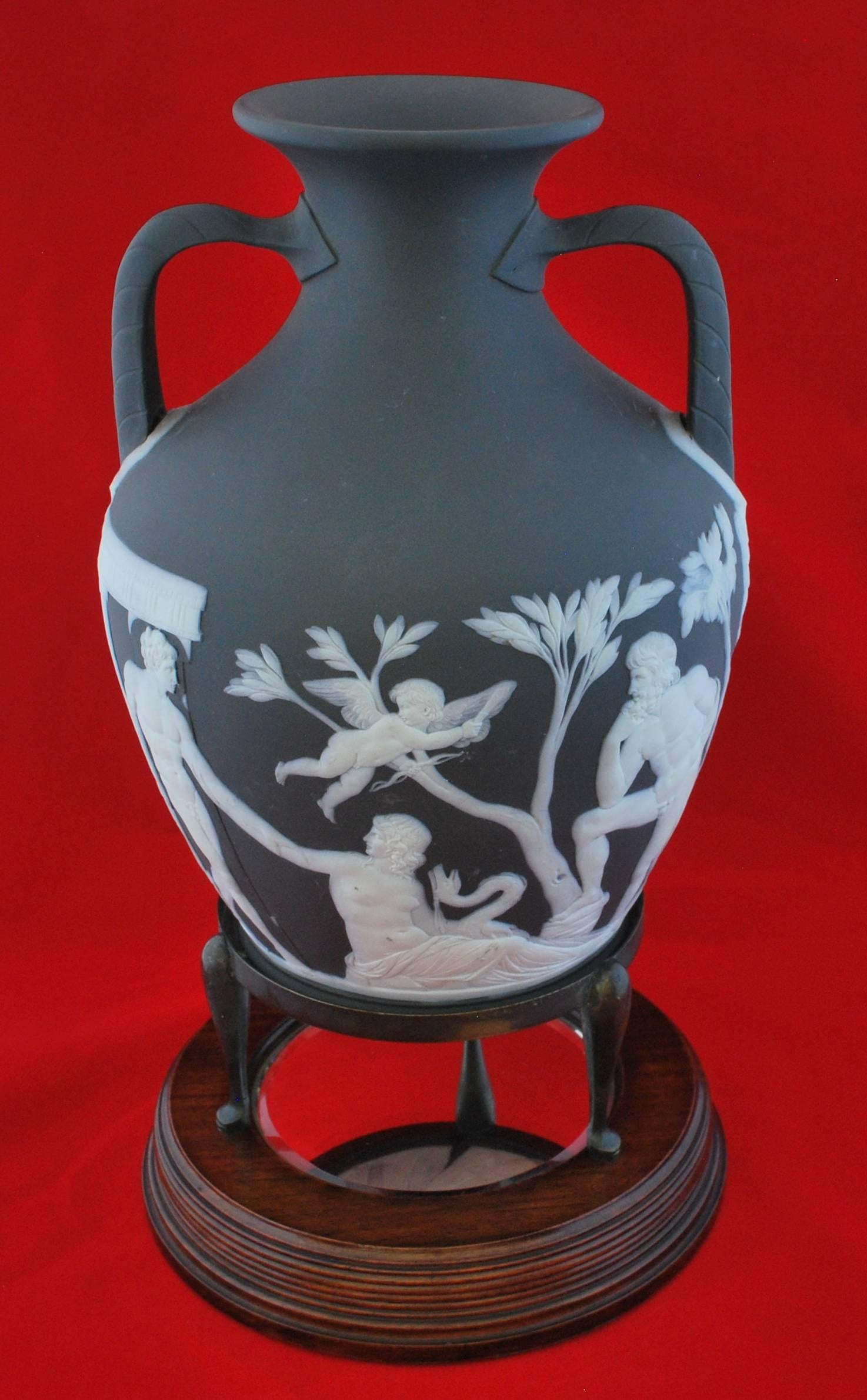 A superb special edition of the Portland Vase, decorated by Bert Bentley. The original mirrored stand shows the decoration to the base.

Although decorated by Bert Bentley, this is the edition known as the Harry Barnard Edition. Barnard was tasked