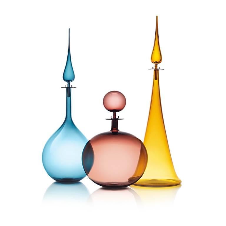 Handsome and architectural, the Large Decanter Fluted Cone is an essential way to add elevation and linear lines to your modern interior environment. Inspired by the greats of Mid-Century Modern design, Joe’s blown glass vessels are a study of