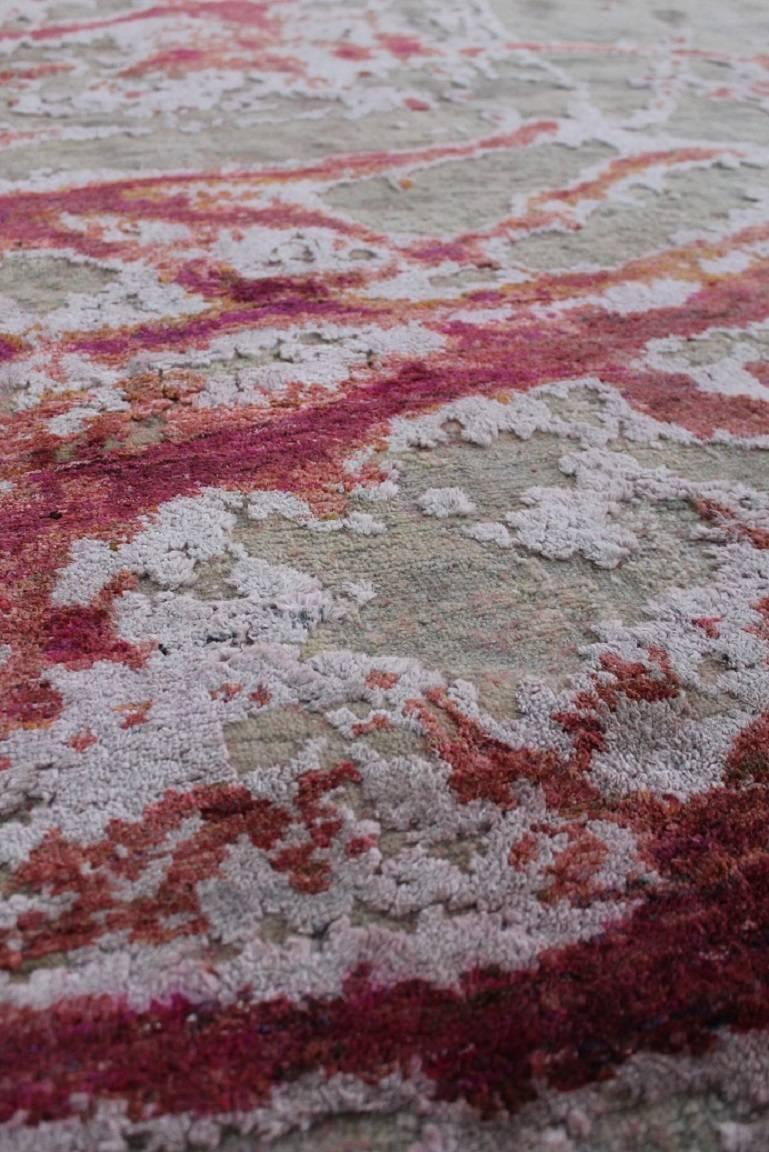The Odyssey collection A breakthrough, three dimensional and multi textural rug collection, inspired by NASA imagery. Distressed wool and natural silk are hand-knotted to create three levels of visual and tactile finery. The collection pairs vintage