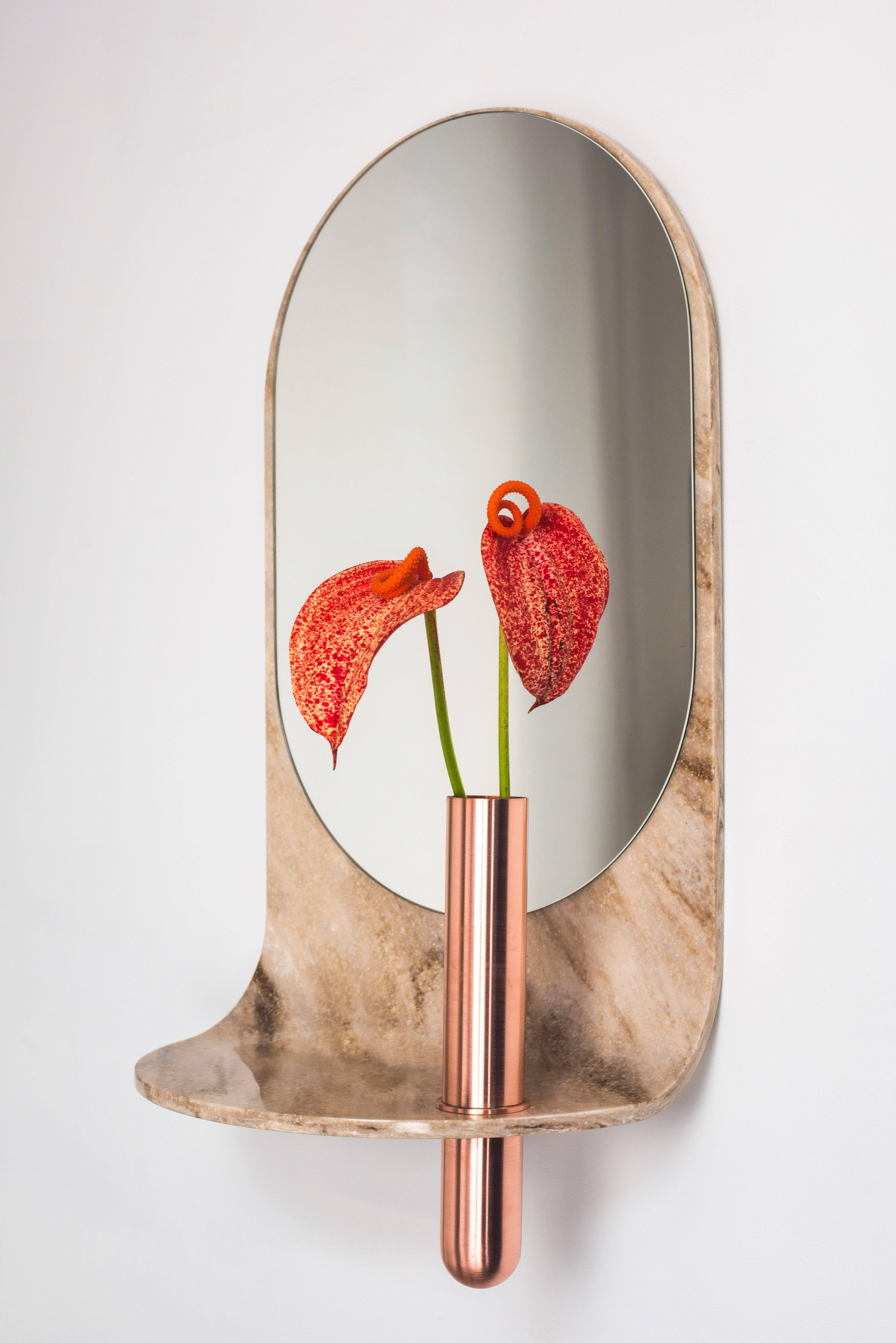 Flats, rounds, and streamlined profiles define the swoop Mirror. Made from thermoformed artificial stone and bronze. Perfect for entryways or hall areas, it provides a shelf for odds and ends like keys and wallets, a vase for flowers, and a gazing