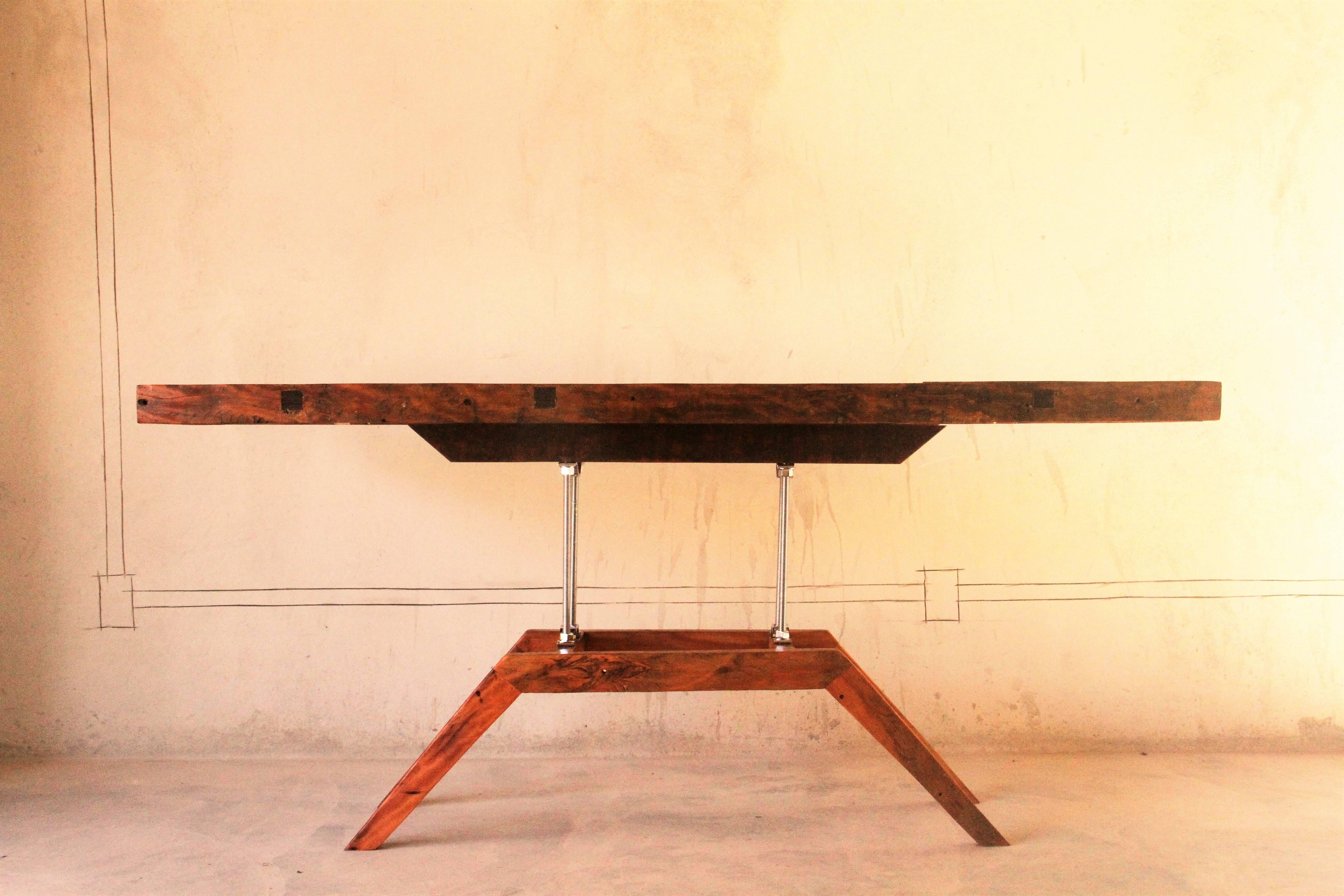 This modern Brazilian hardwood and steel console is a one of a kind piece, signed, made handmade by the artist. Named 