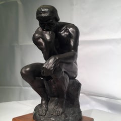 AUGUSTE RODIN Sculpture, "Le Penseur"Museum reproduction.