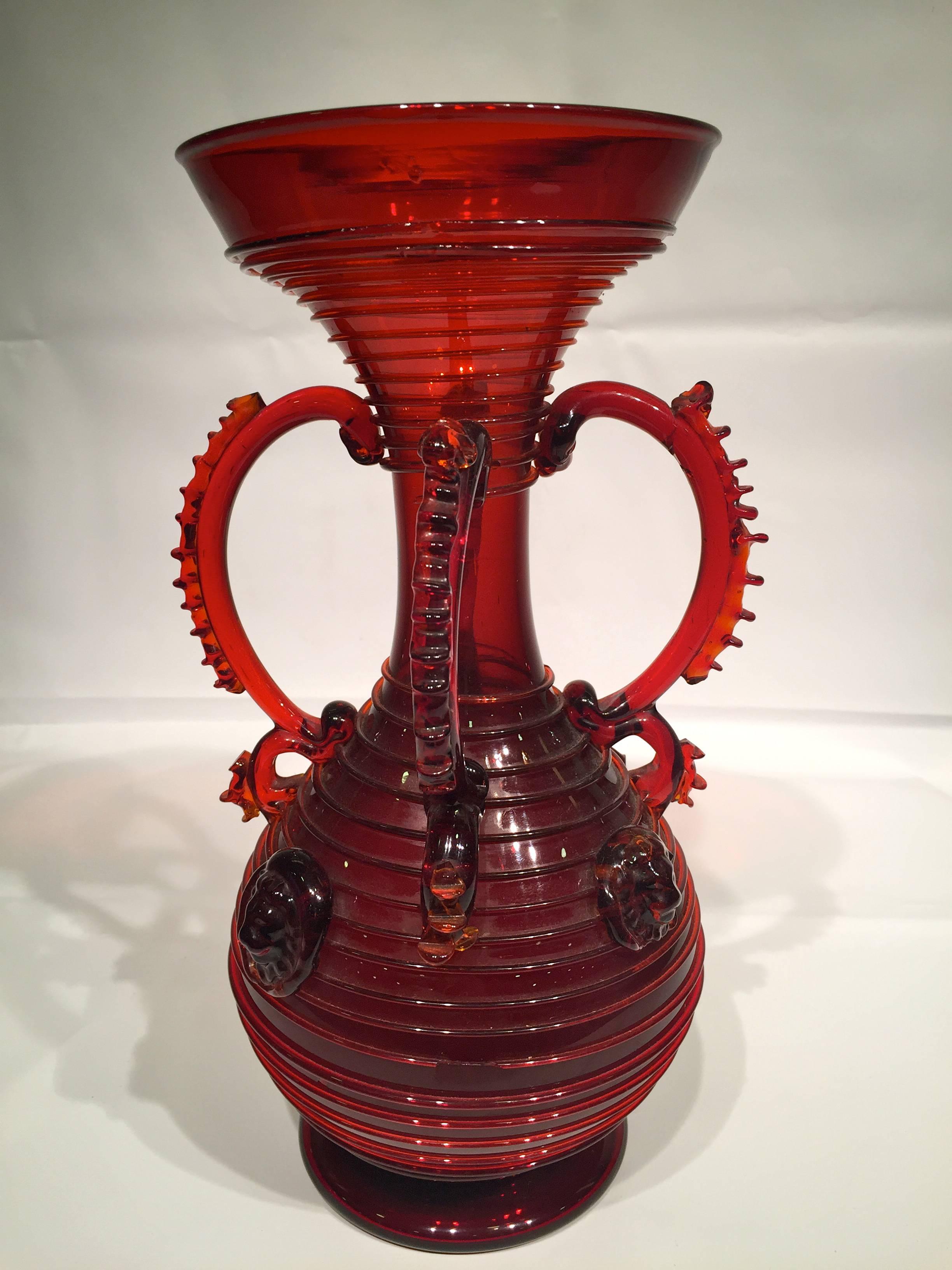 Artistic blown glass of Murano, attributed to Benvenuto Barovier, circa 1890. Intense red with applications.